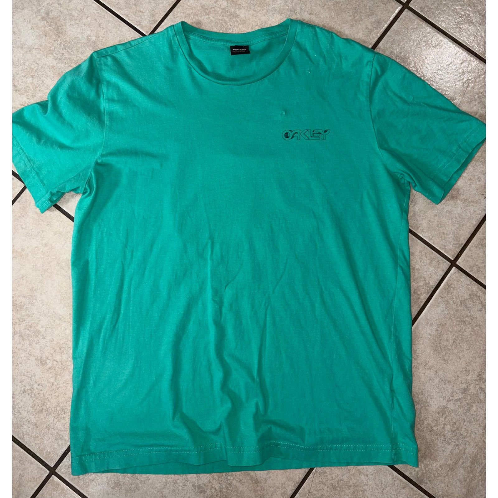 Oakley Oakley men’s shirt medium blue teal optics regular fit Size US M / EU 48-50 / 2 - 1 Thumbnail