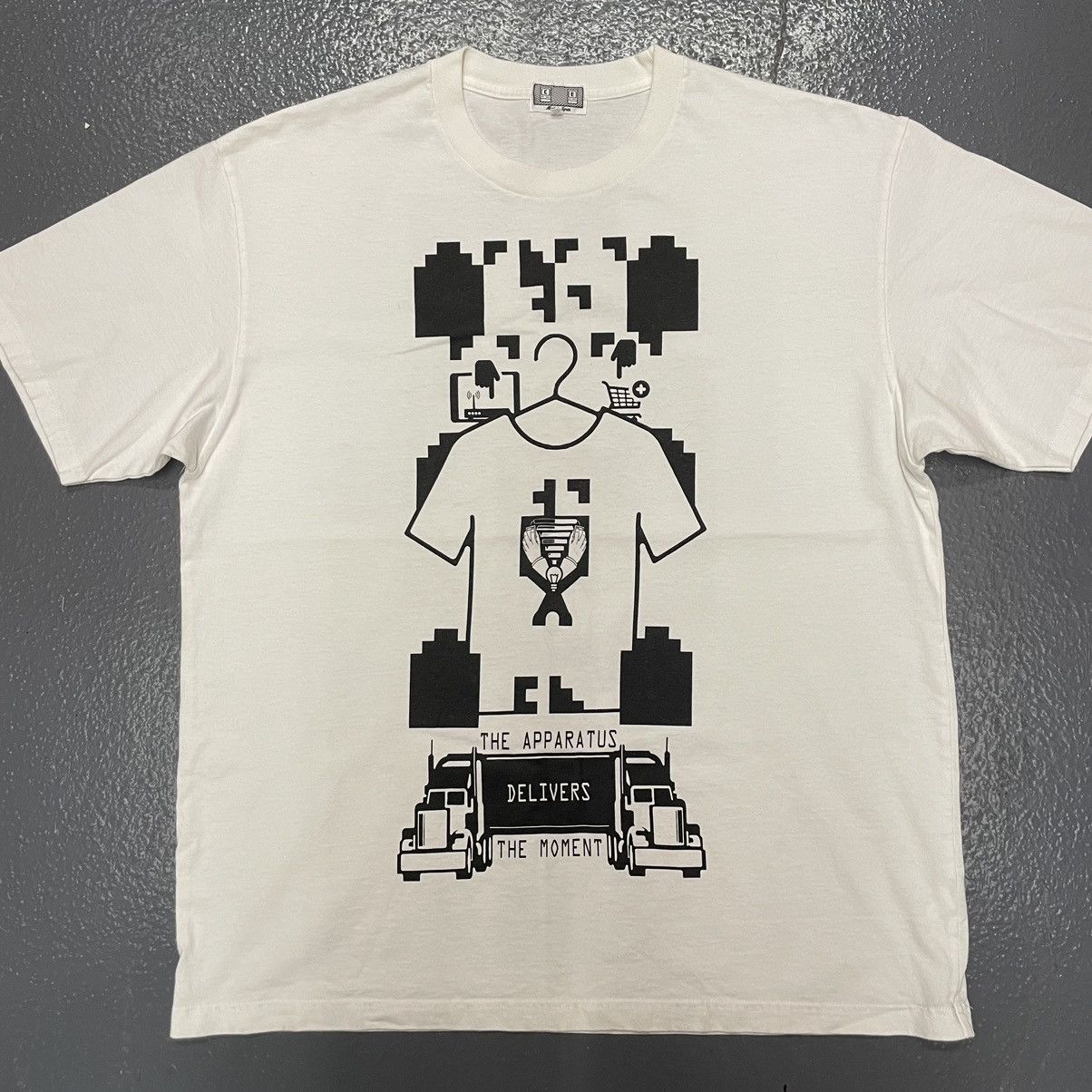The Apparatus Delivers The Moment T-shirt Graphic Japan