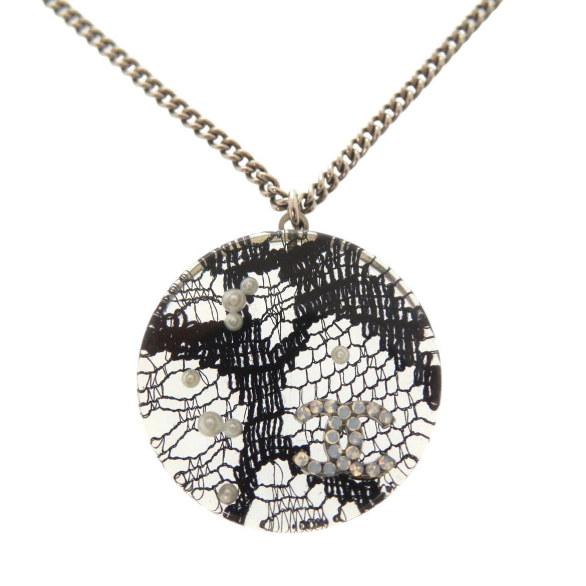 Chanel Excellent condition Chanel Coco Mark lace, faux pearl, stone, and resin necklace in silver black. Item number 0057CHANEL Size ONE SIZE - 1 Thumbnail