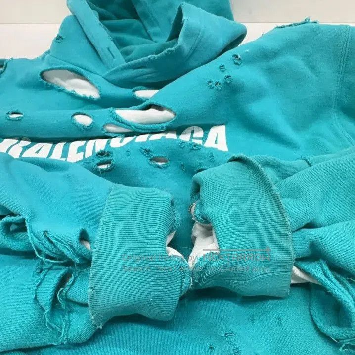 Balenciaga Balenciaga Distressed Hooded Sweatshirt in Sky Blue. Size US XXS / EU 40 - 8 Thumbnail