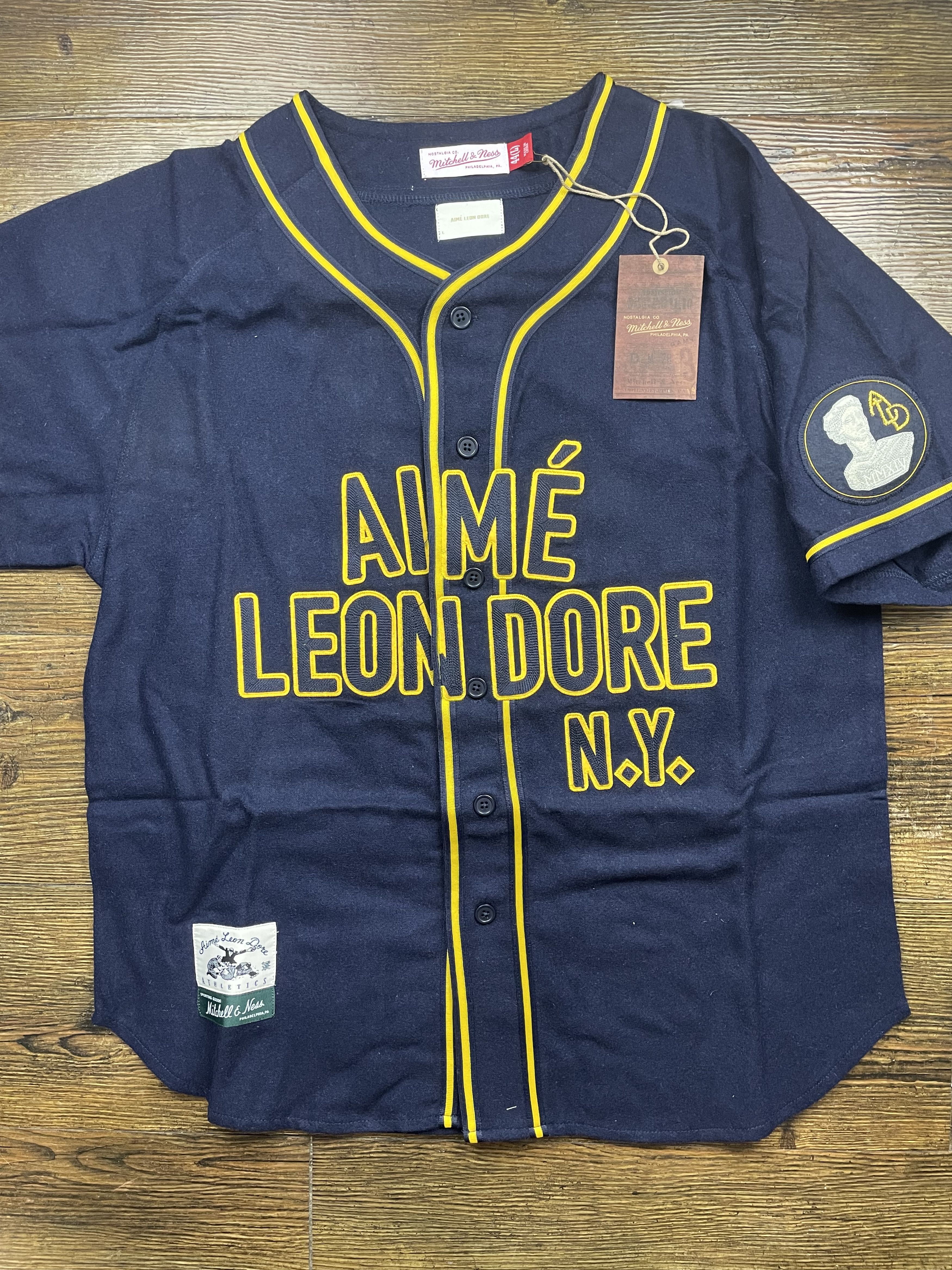 AIME LEON DORE NAS BASEBALL JERSEY L 【公式通販】