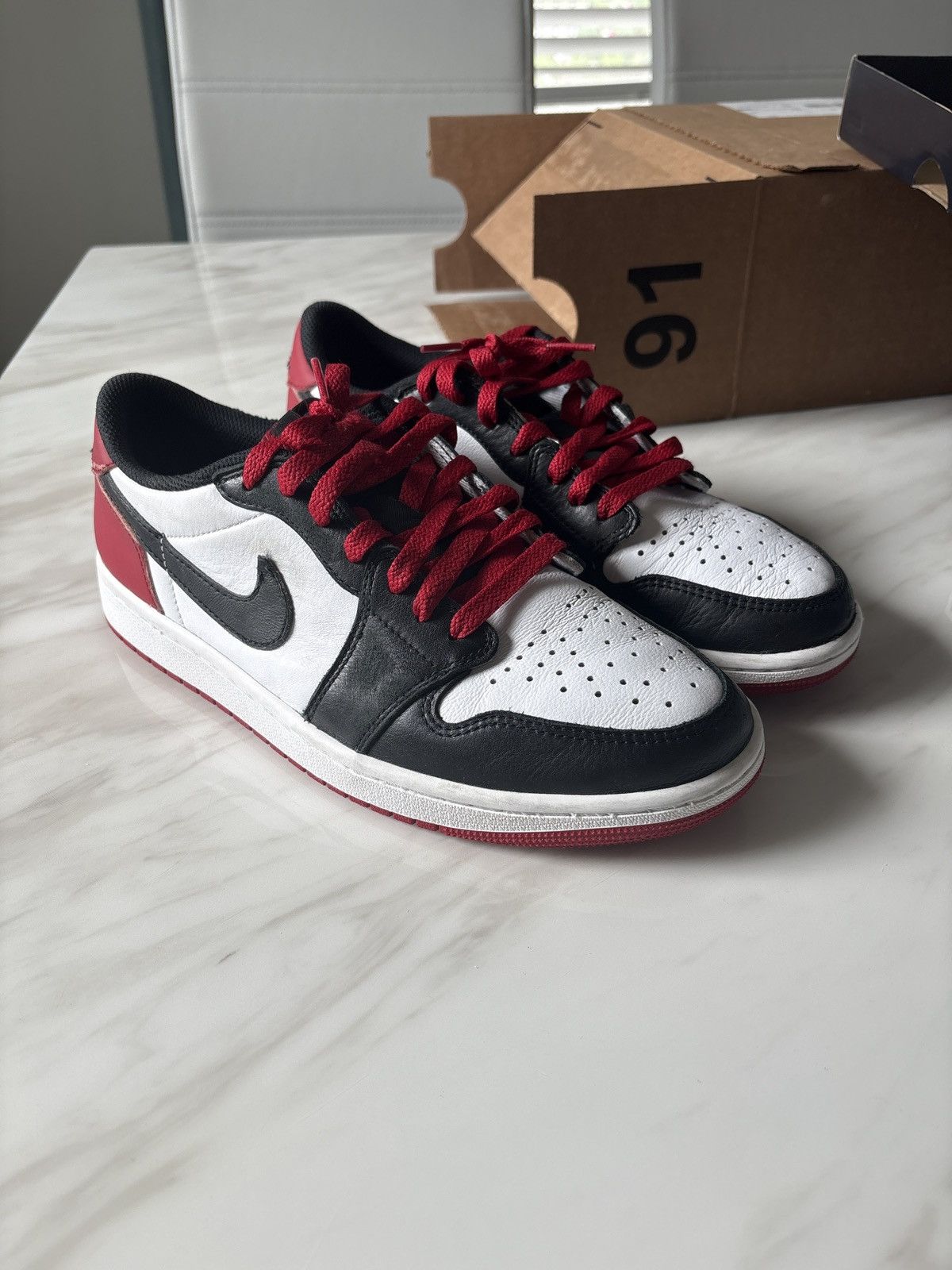 Jordan Brand Jordan 1 Retro Low OG Black Toe Size US 9 / EU 42 - 1 Thumbnail