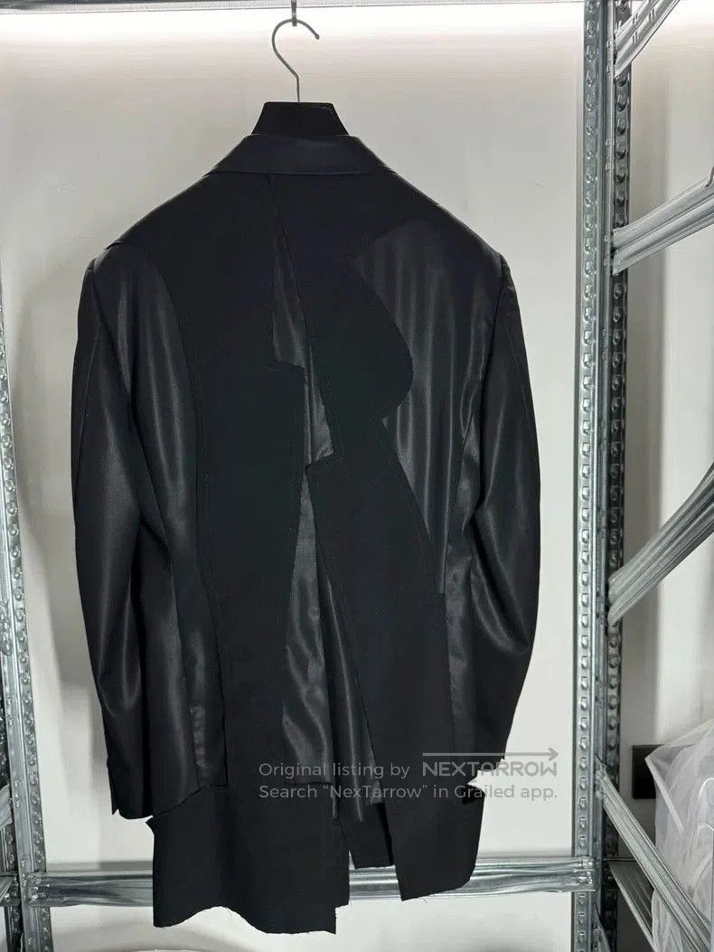 COMME des GARCONS Wool Deconstructed Blazer.