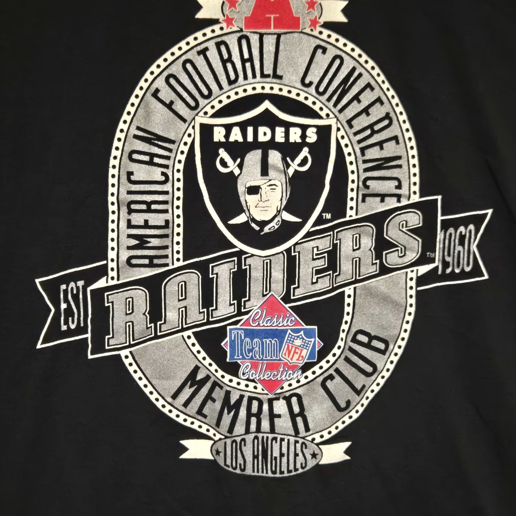 Nutmeg VINTAGE Nutmeg Raiders T-Shirt Men XL Black 90s USA NFL Warrior Angel Graphic Print Crew Neck Short Sleeve Size US XL / EU 56 / 4 - 5 Thumbnail