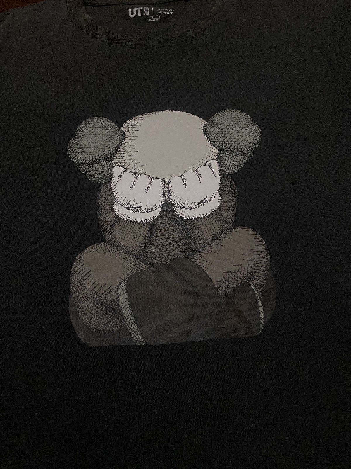 Hypebeast × Kaws FIRE 🔥🔥 UNIQLO X KAWS TOKYO FIRST SAD DESIGN Size US L / EU 52-54 / 3 - 6 Thumbnail