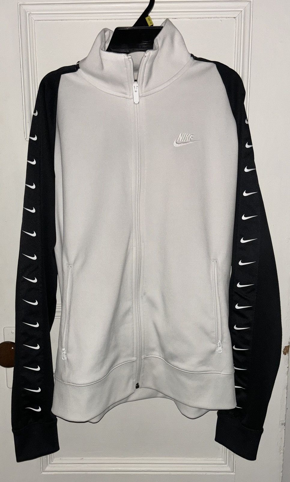 Nike sportswear taped track jacket best sale