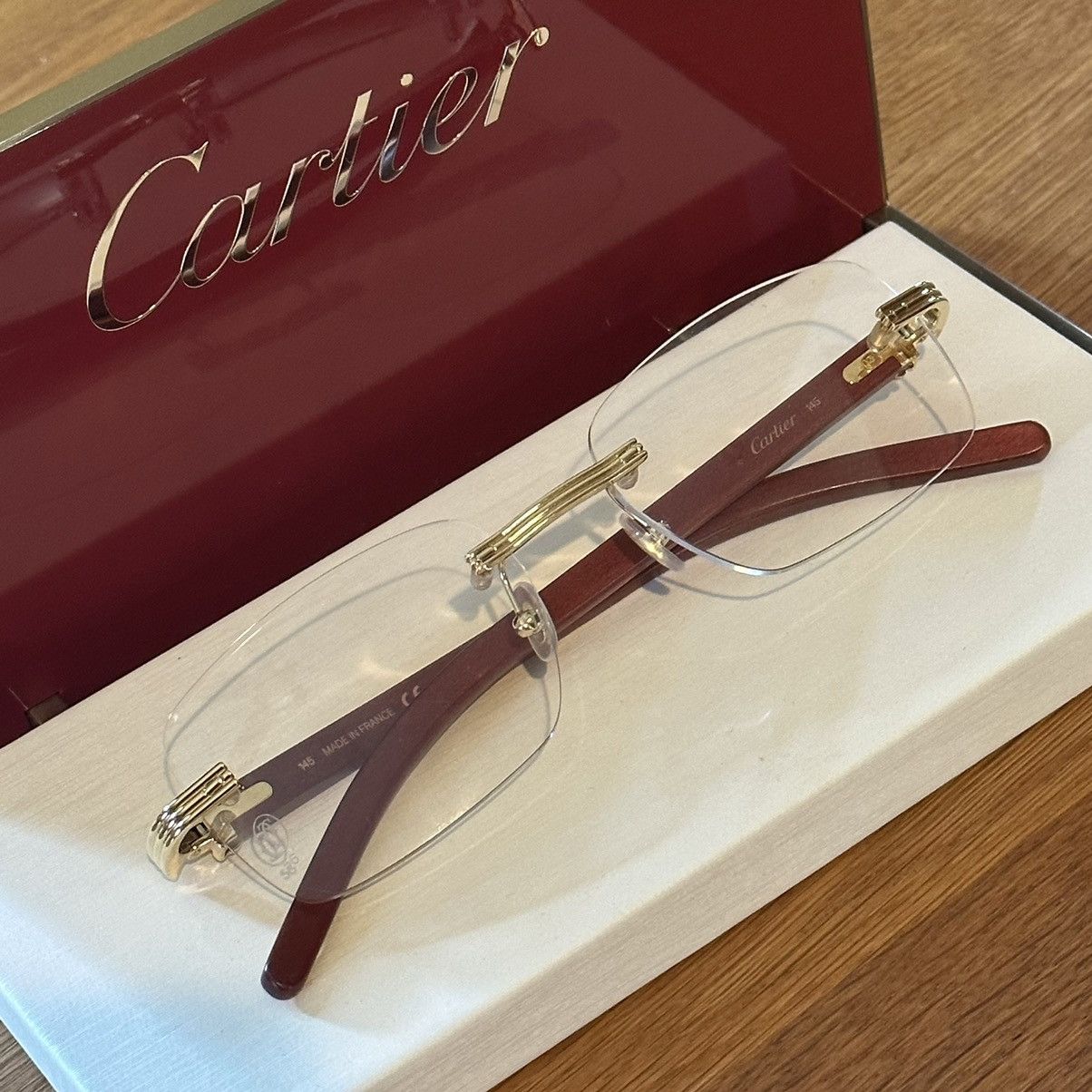 Cartier CT0186O FW23 Red Rimless Glasses | Grailed