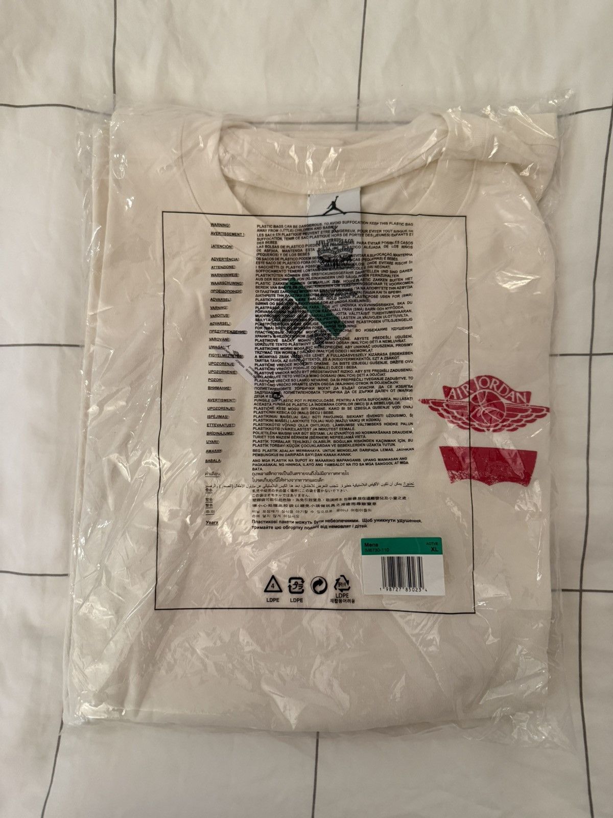 Jordan Brand × Levi's Air Jordan Levi's Long-Sleeve Tee Ivory/Black/University Red Size US XL / EU 56 / 4 - 7 Thumbnail