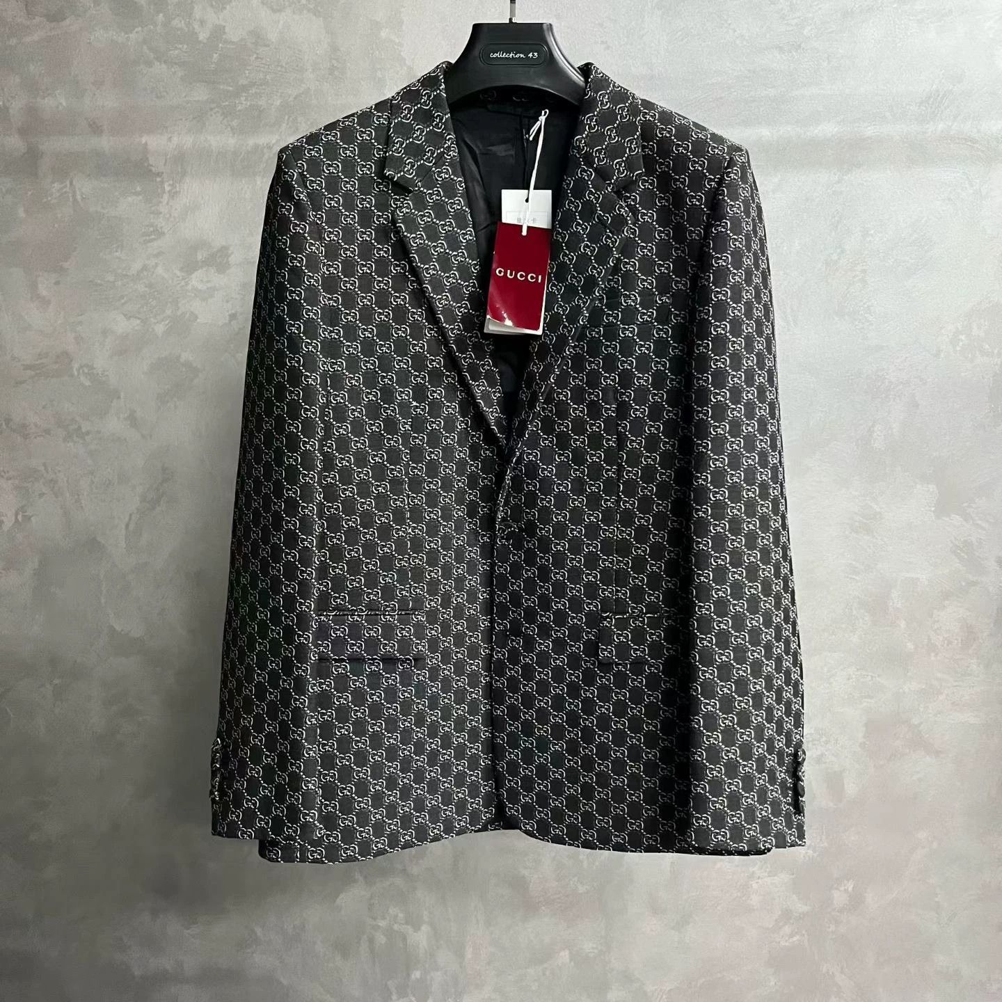 gray logo-printed long sleeve blazer