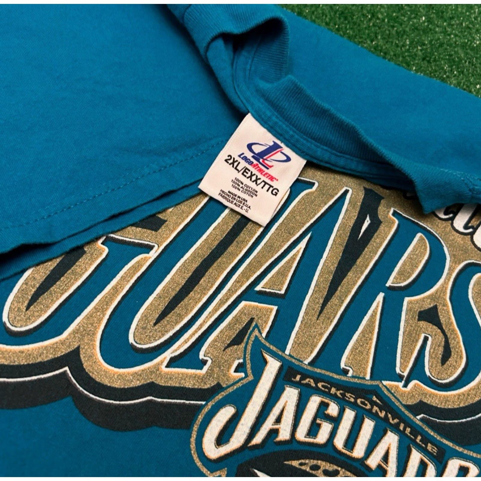 Logo Athletic VINTAGE Jacksonville Jaguars Classic Logo Spell Out VTG Shirt Mens XXL Blue 90s Sports Hip Hop T-Shirt Logo Athletic Short Sleeve Size US XXL / EU 58 / 5 - 2 Thumbnail
