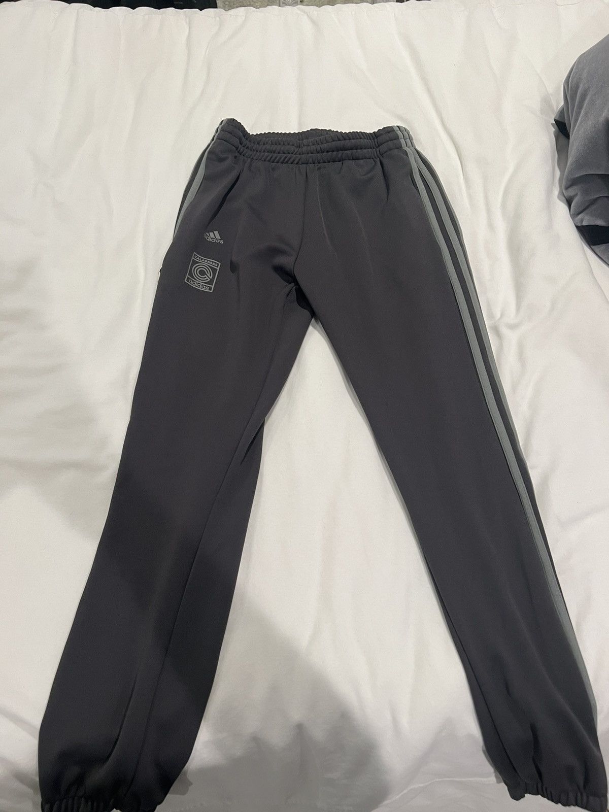 Yeezy Calabasas Track Pants and Mesut Ozil Jersey Bundle