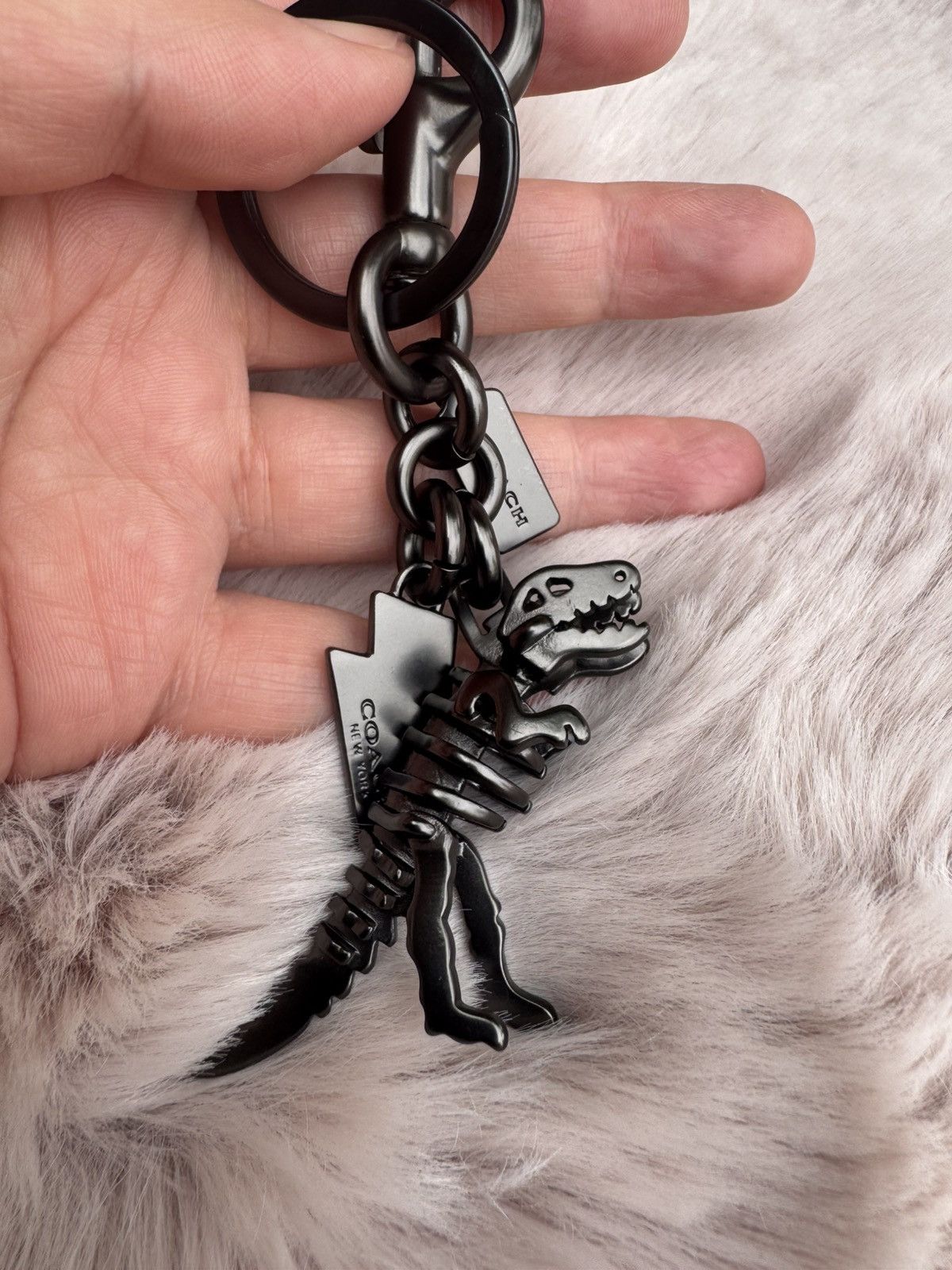 Coach Coach Metal Small Rexy T-Rex Skeleton Puzzle Charm Keychain Size ONE SIZE - 8 Thumbnail