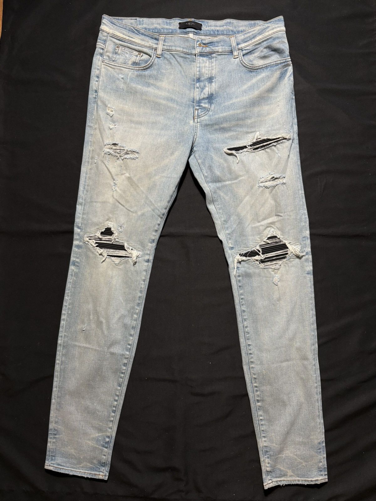 Amiri MX1 Light Wash / Black Patch Jeans- Size 38