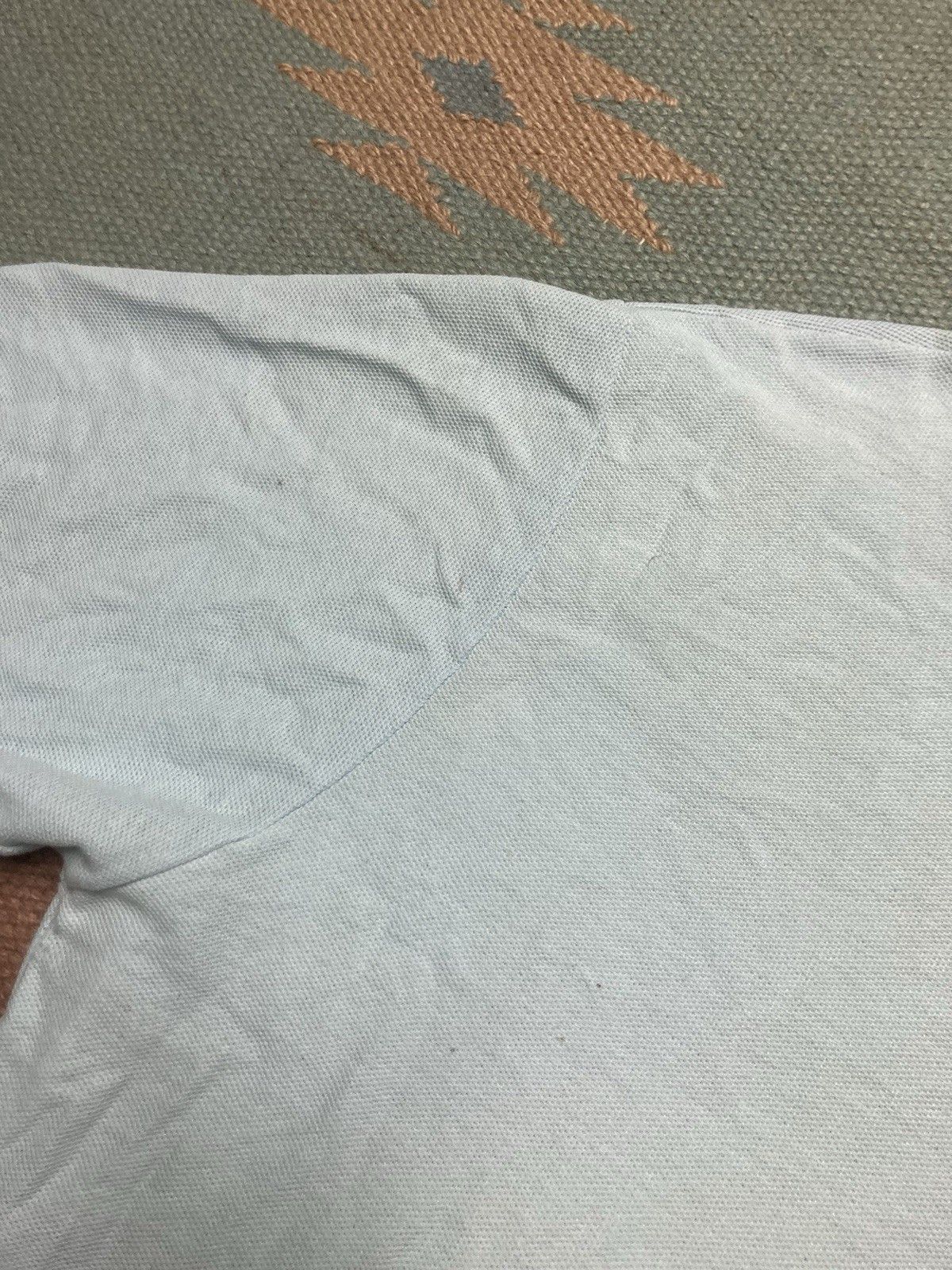 Vintage Vintage 90s polo shirt paint stained light blue adult large Size US L / EU 52-54 / 3 - 4 Thumbnail
