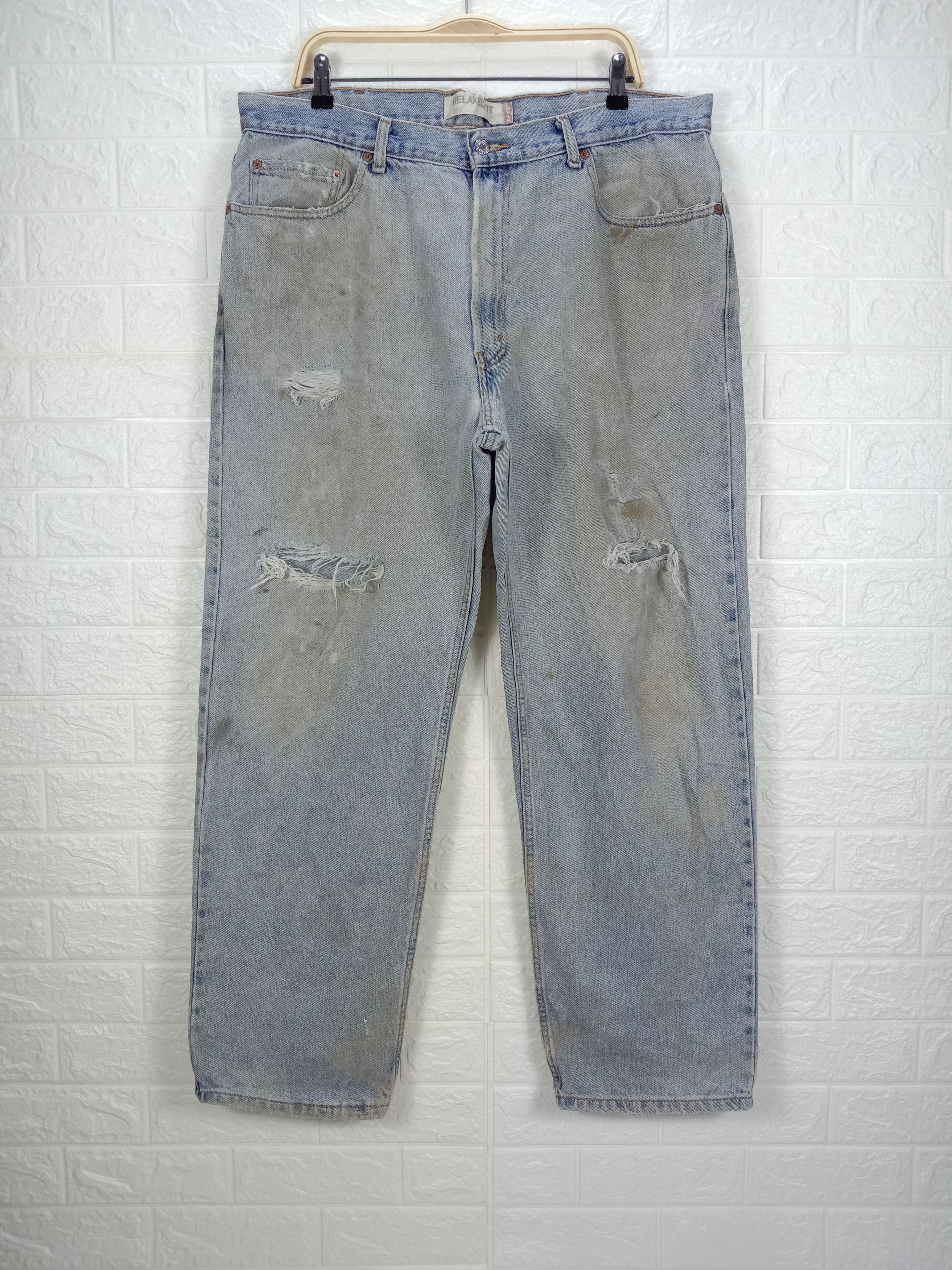 image of Vintage Levi's 550 Jeans Dirty Wash Distressed Denim in Light Blue, Men's (Size 40)