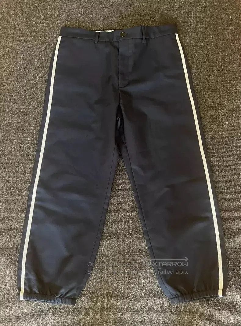 Gucci Black Casual Pants with White Stripes.