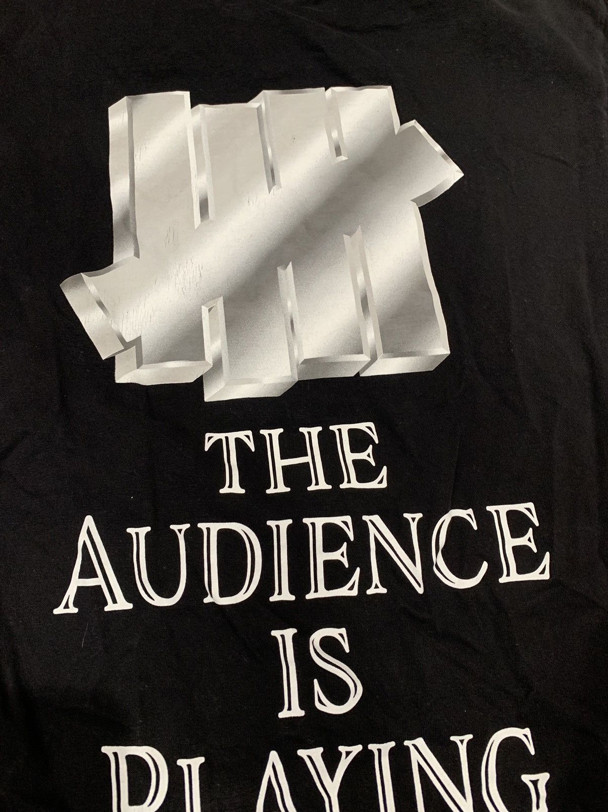 Undefeated Undefeated “The Audience is playing” black tee Size US M / EU 48-50 / 2 - 5 Thumbnail