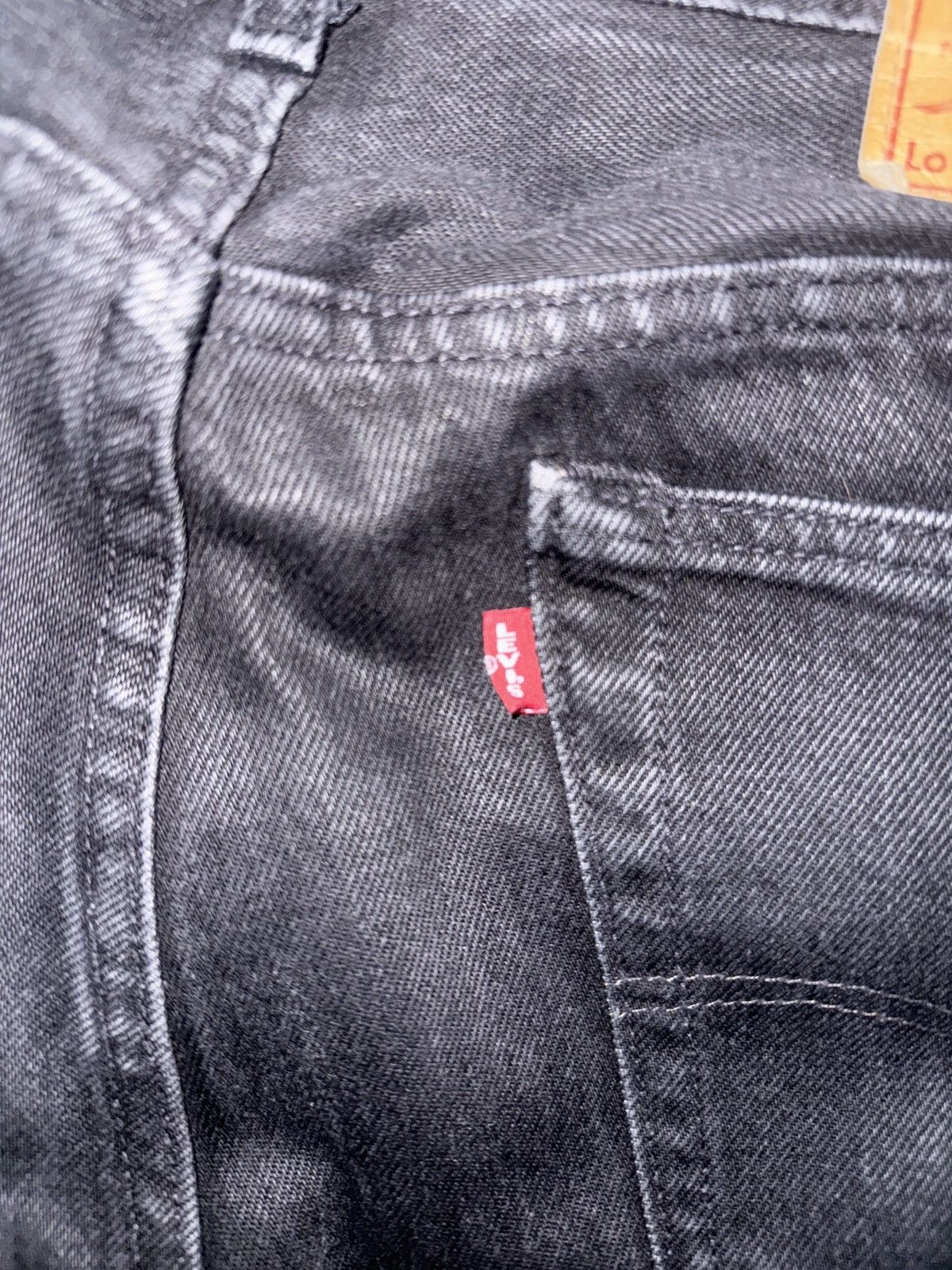 DENIM TEARS BLACK WREATH JEANS