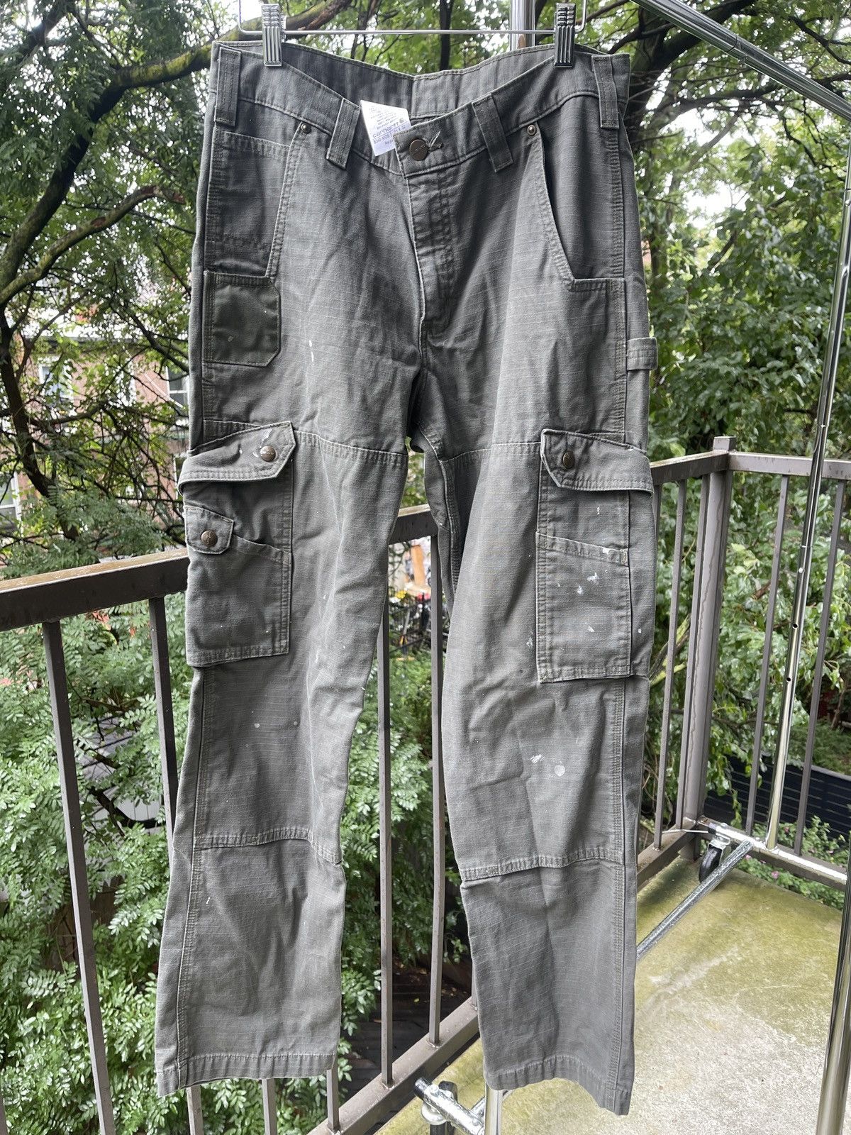 image of Carhartt Faded Paint Splattered Cargo Pants in Green, Men's (Size 34)
