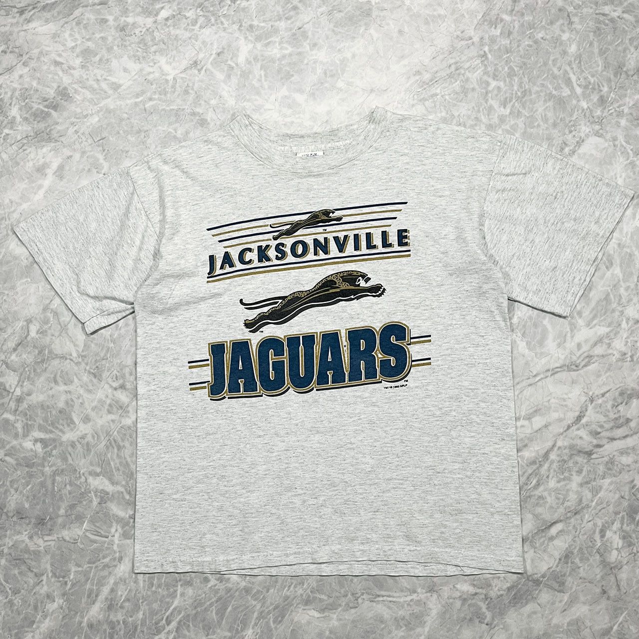 image of Made In USA x Nfl VTG 90's Nfl Jacksonville Jaguars 1993 T-Shirt Banned Logo in Grey (Size Large)