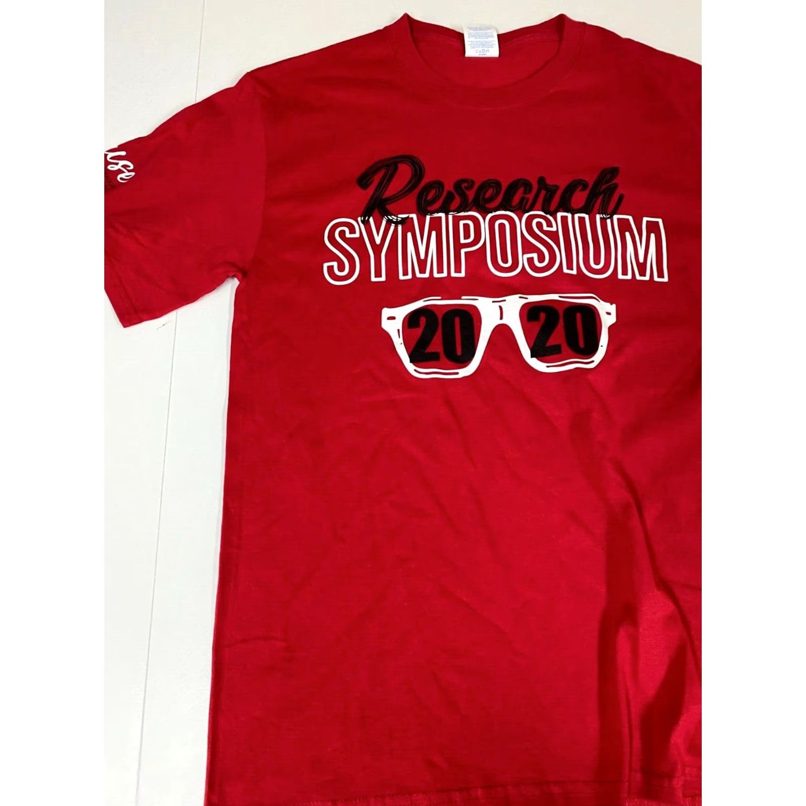 Port & Company Port & Company Mens T-Shirt S Red Graphic Research Symposium 2020 Glasses Crew Neck Short Sleeve Cotton Spandex Logo Stars Classic Vintage: No Size US S / EU 44-46 / 1 - 3 Thumbnail
