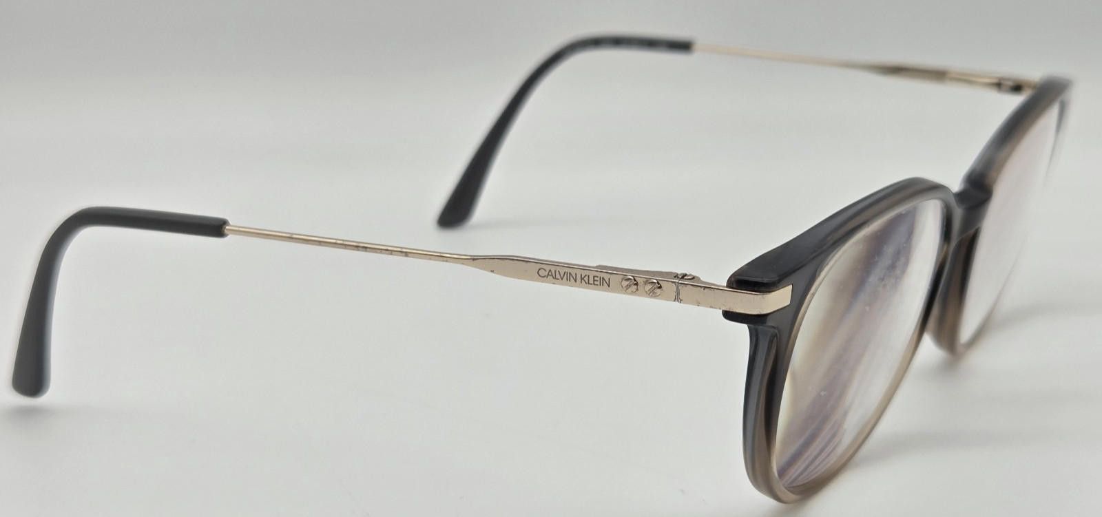 Calvin Klein Calvin Klein CK19712 Eyeglasses FRAMES ONLY 51-17-140 027 Size ONE SIZE - 8 Thumbnail