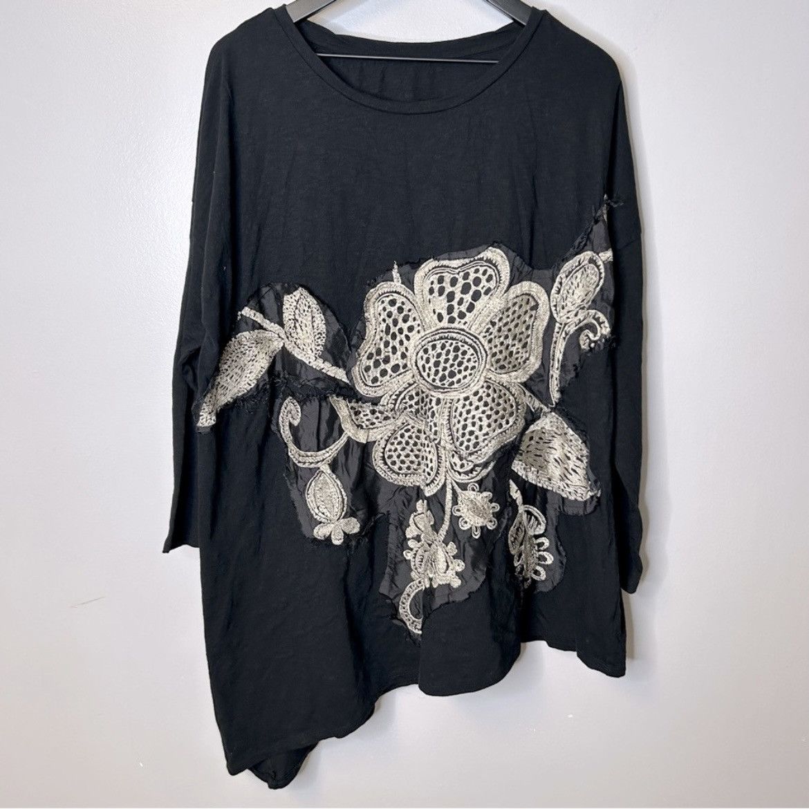 image of Krista Larson Long Sleeve Asymmetrical Appliqué Floral Top in Black, Women's