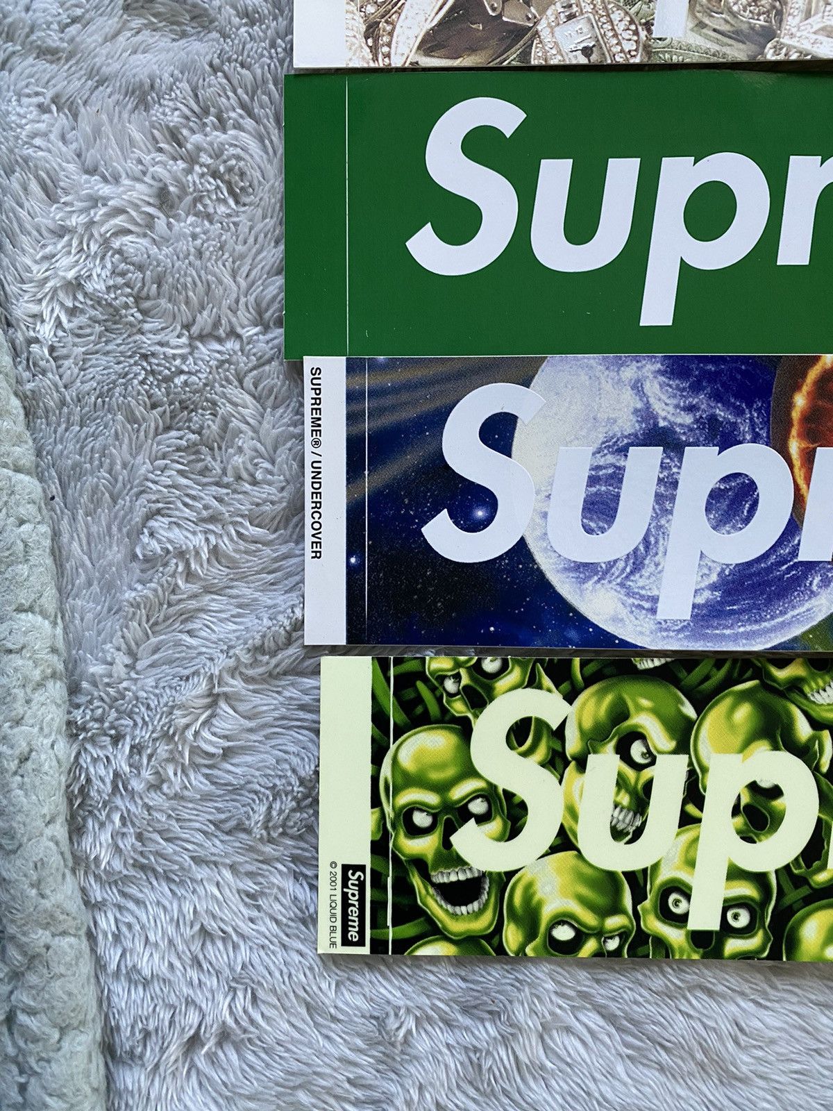 Supreme box logo sticker lot CNN bling undercover skull