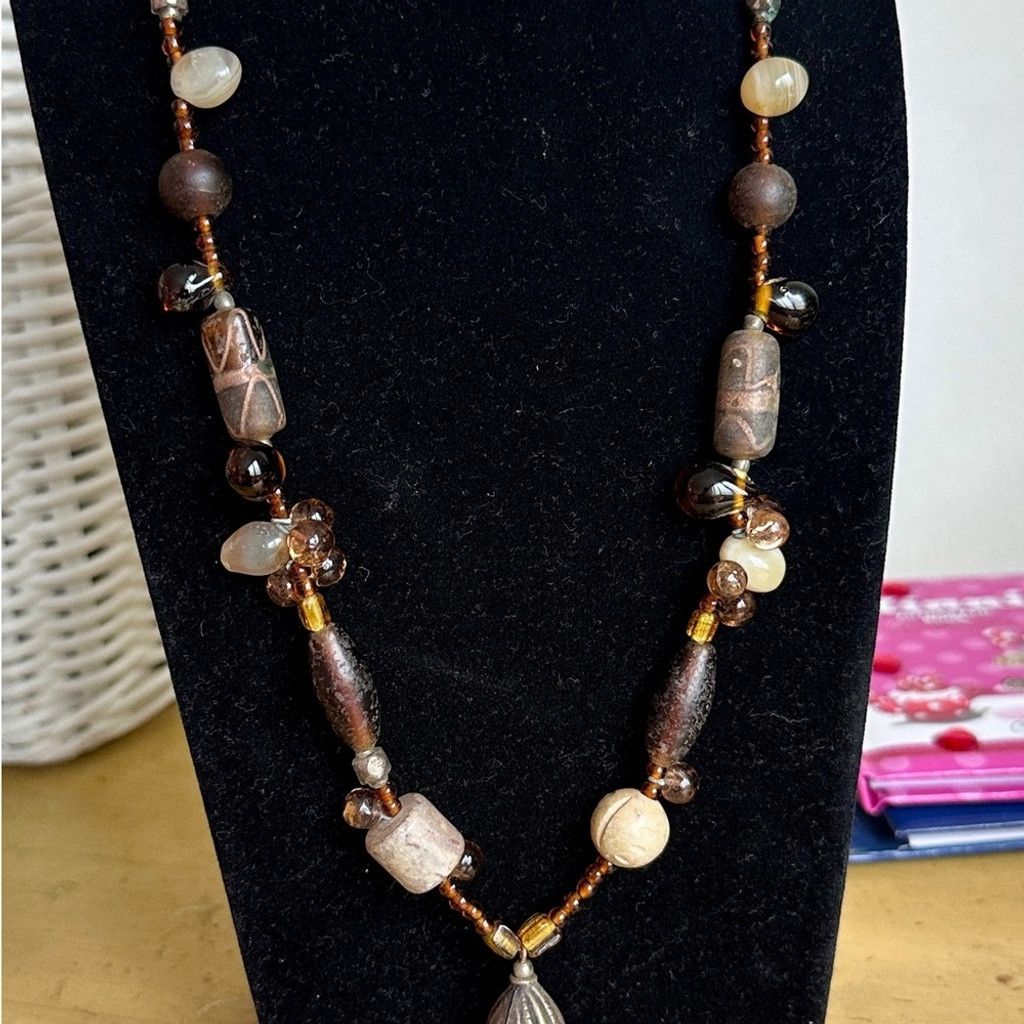 The Unbranded Brand Bohemian Artisan Beaded Tassel Necklace Brown Size ONE SIZE - 1 Thumbnail