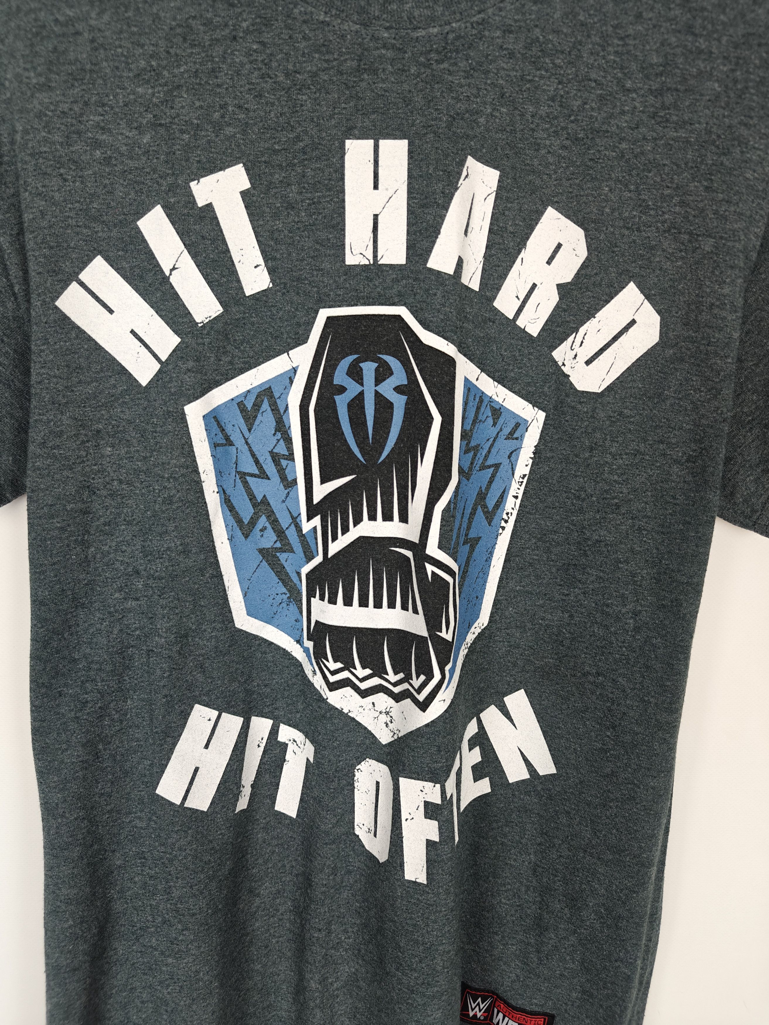 WWE WWE T-Shirt Merch Roman Reigns Hit Hard Gray size M Size US M / EU 48-50 / 2 - 7 Thumbnail