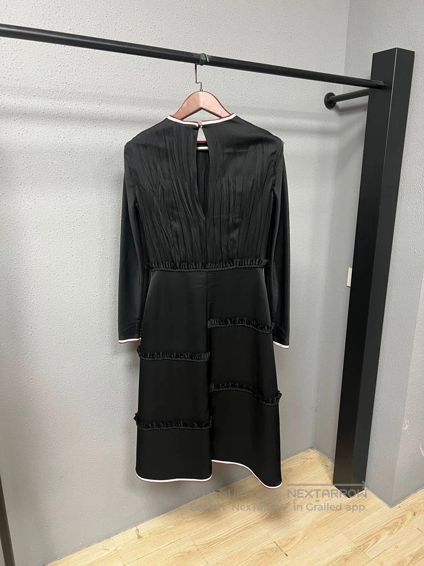 elegant black dress by Loewe.
