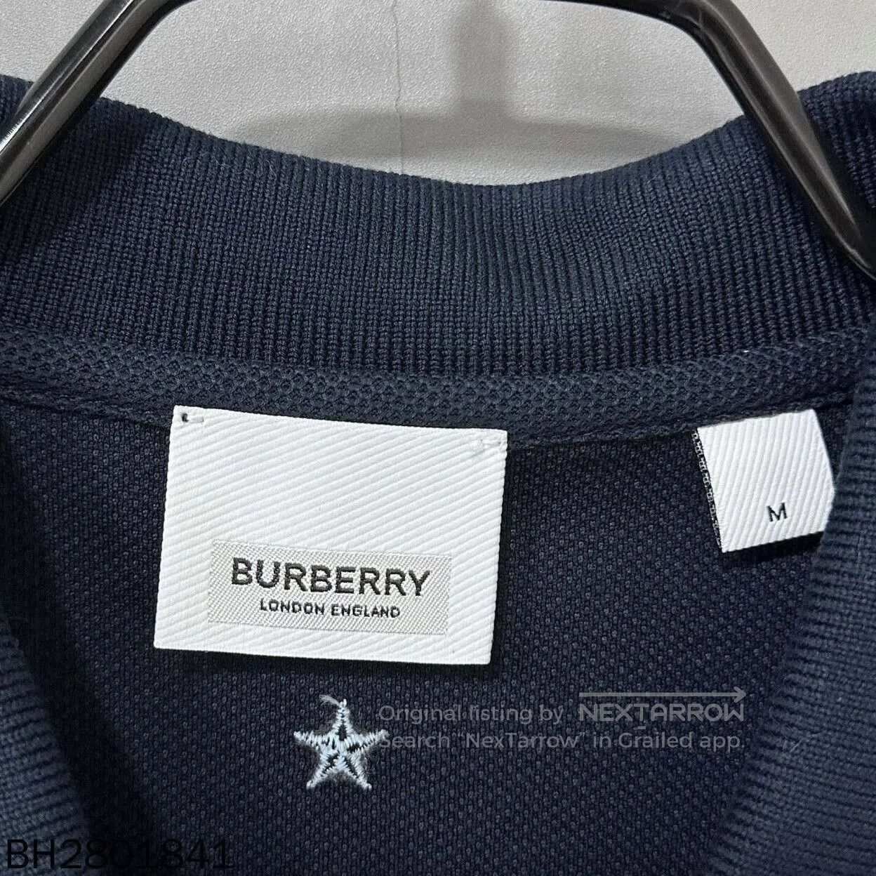 Burberry navy embroidered logo polo shirt by Burberry. Size US M / EU 48-50 / 2 - 4 Thumbnail
