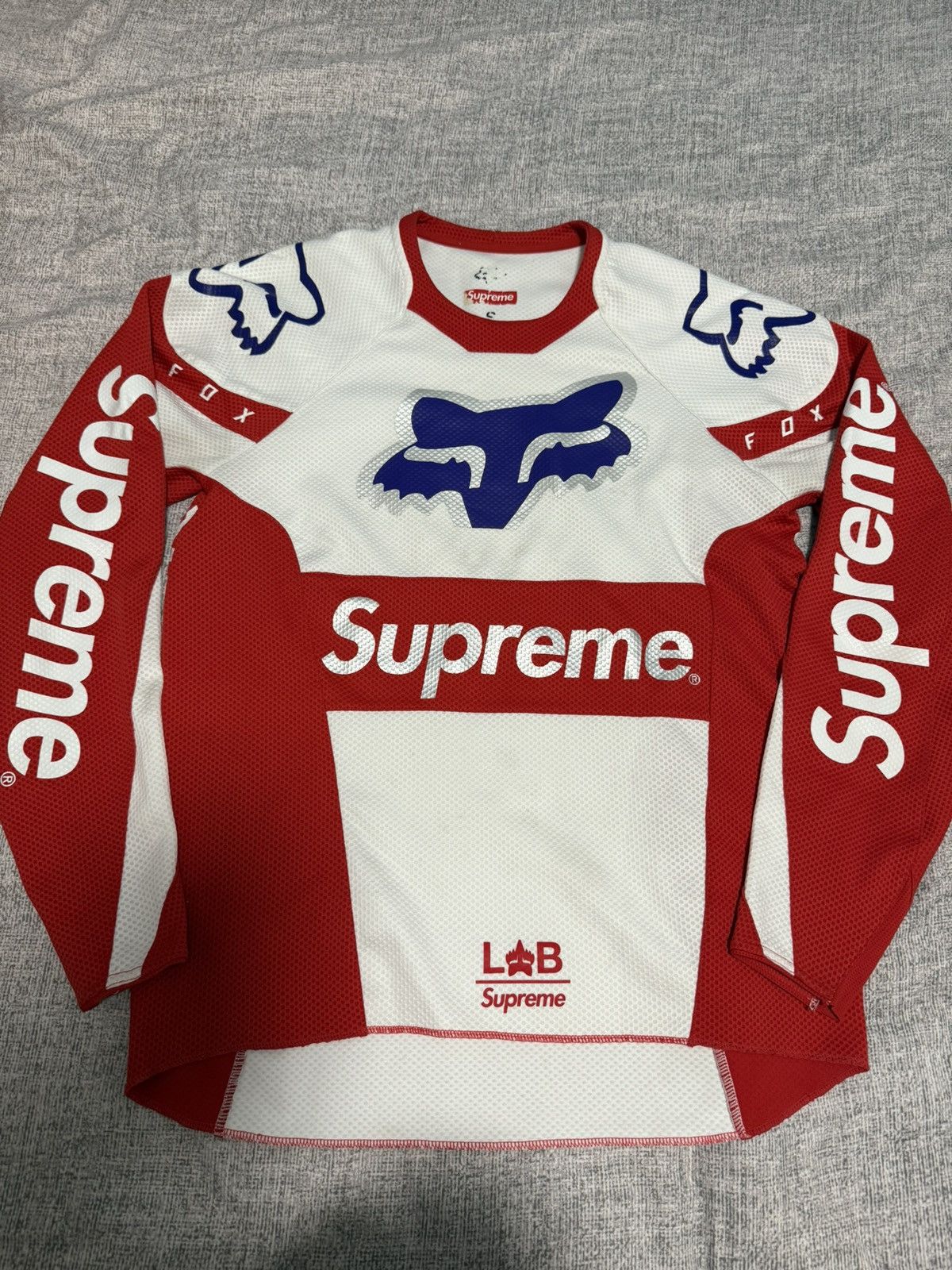 Fox Racing × Supreme Supreme Fox racing moto Jersey top white red Size US S / EU 44-46 / 1 - 1 Thumbnail