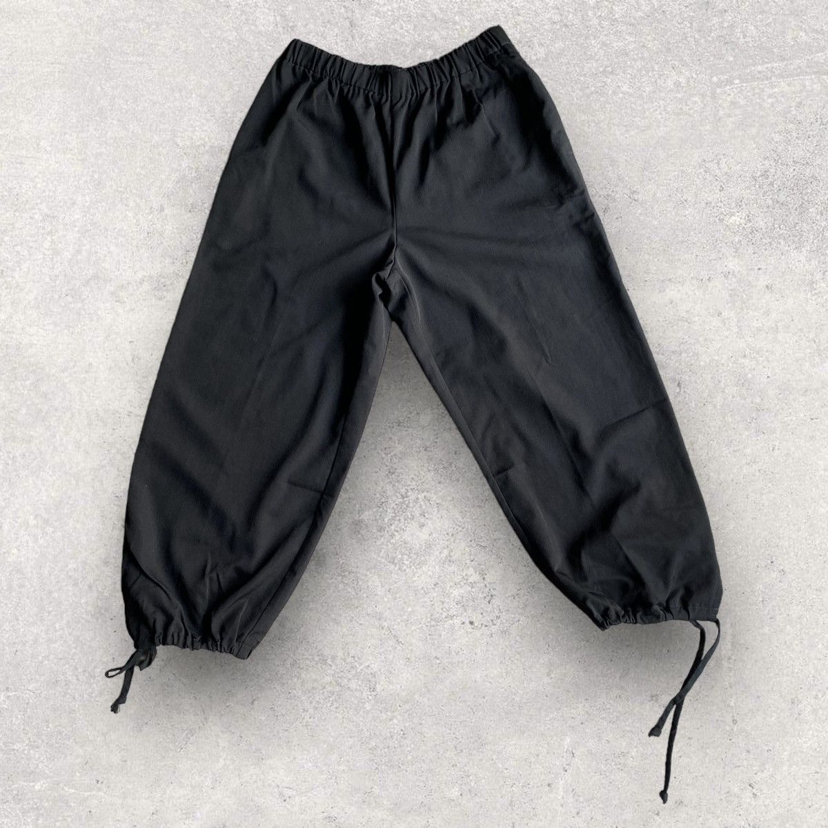 image of Comme Des Garcons x Comme Des Garcons Girl Aw 2020 Tie Details Cropped Wool Trousers in Black, Wome