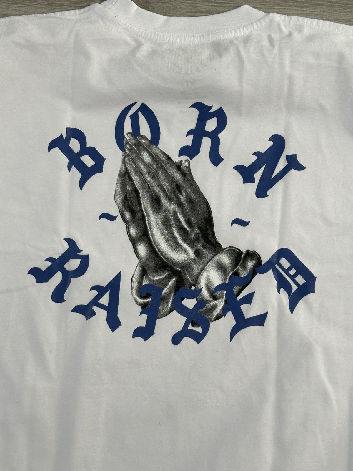 Born X Raised BORN X RAISED Praying Hands Rocker Tee White Blue Size XL Size US XL / EU 56 / 4 - 5 Thumbnail