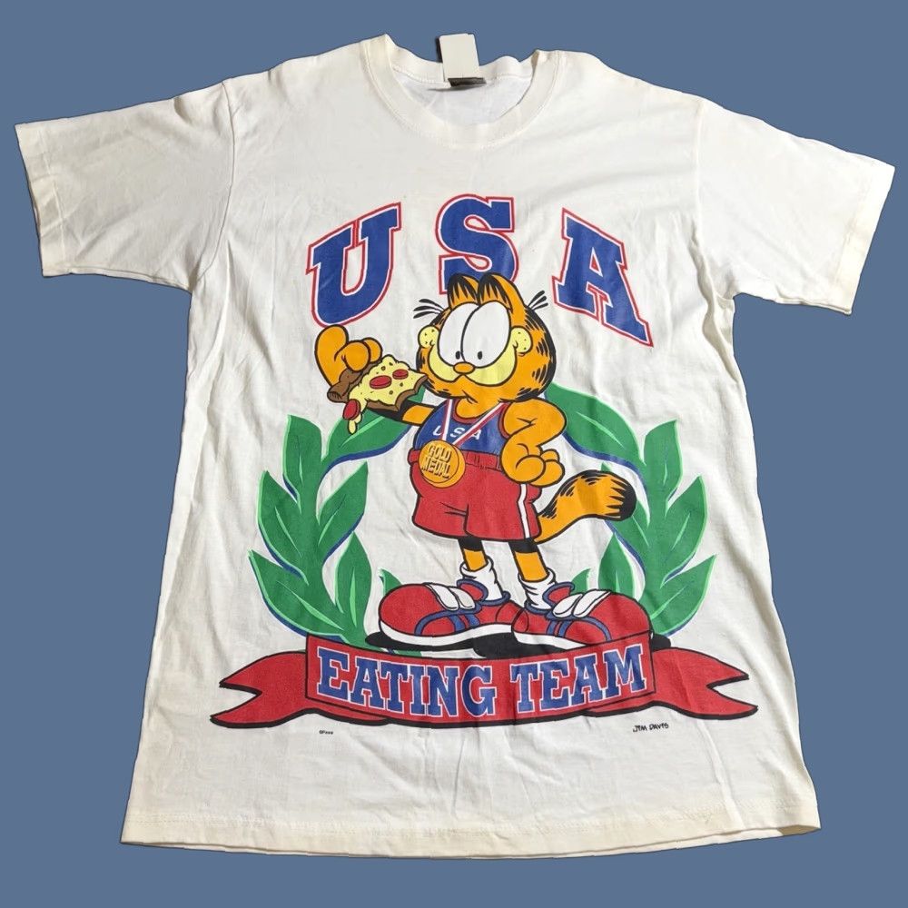 Vintage VINTAGE Garfield USA Eating Team Pizza Graphic Tee Shirt Mens Large NWT White Cotton Crew Neck Short Sleeve MEX Spring Ford USA Theme 90s Size US L / EU 52-54 / 3 - 1 Thumbnail