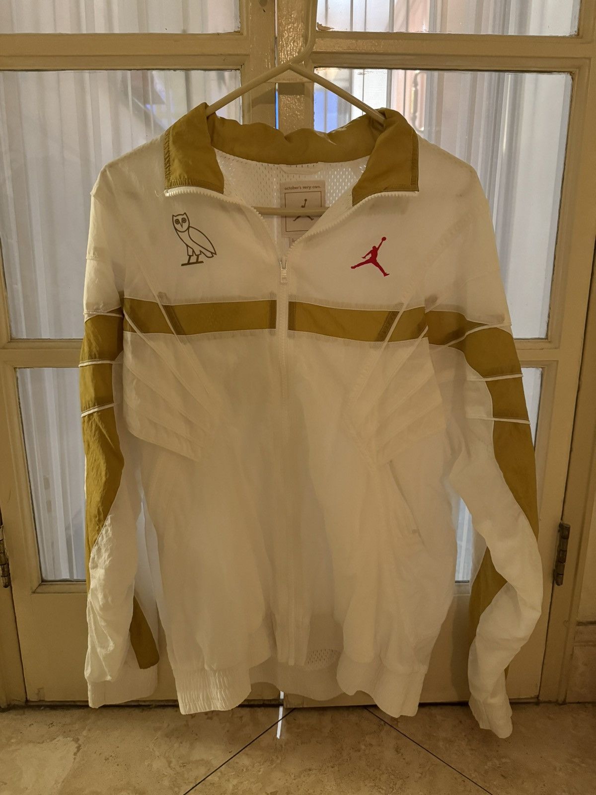 image of Ovo Octobers Very Own X Jordan Brand Flight Track Jacket in White, Men's (Size Small)