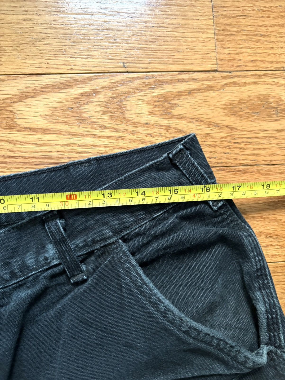 Vintage, sun-faded Carhartt work pants