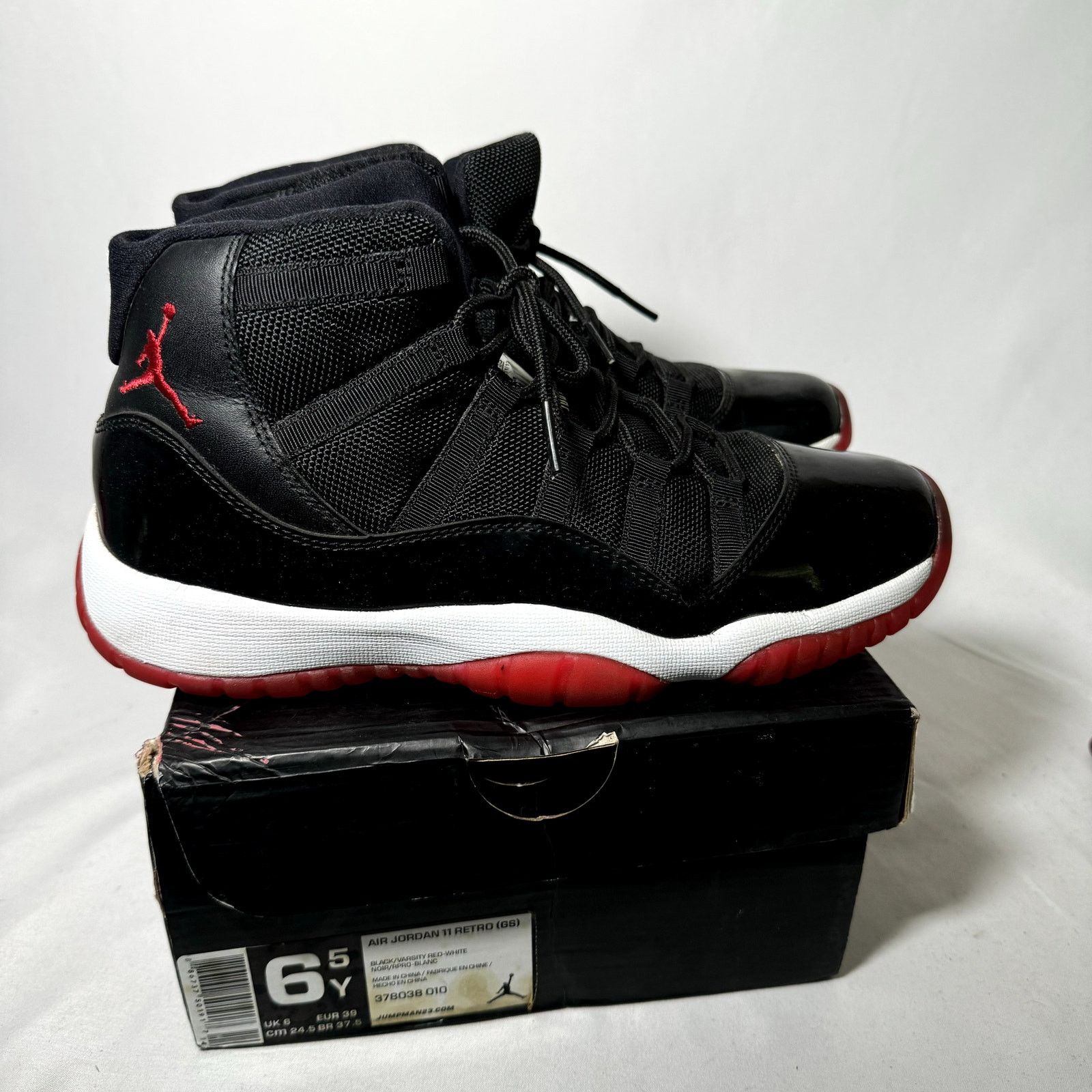 Jordan Brand × Nike Size 6.5 - Nike Air Jordan 11 Retro GS Bred 2012 Men's Shoes Size US 6.5 / EU 39-40 - 1 Thumbnail