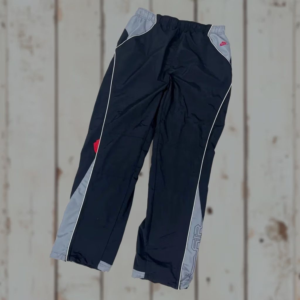 Nike VINTAGE Nike Air Pants Nike Pants Men L Black Nylon Striped Swoosh 00s Baggy 90s 00s Y2K Track Pants Waist 40cm 31.5in Knee 12.6in Men Size US 33 - 1 Thumbnail