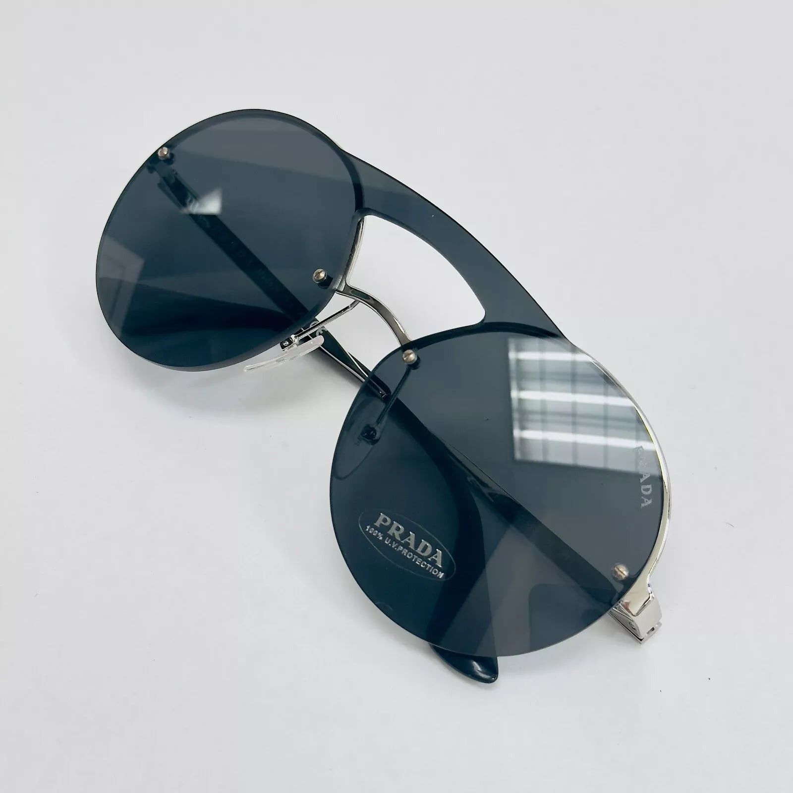 Prada PRADA 65T CINEMA Sunglasses Silver Black Rimless PR65TS Size ONE SIZE - 6 Thumbnail