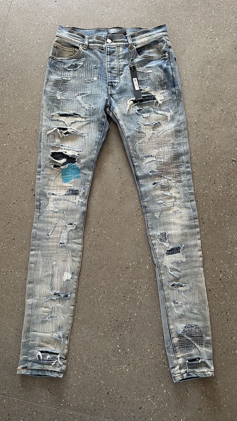 image of All Over Repaired Amiri Jeans in Blue, Men's (Size 30)