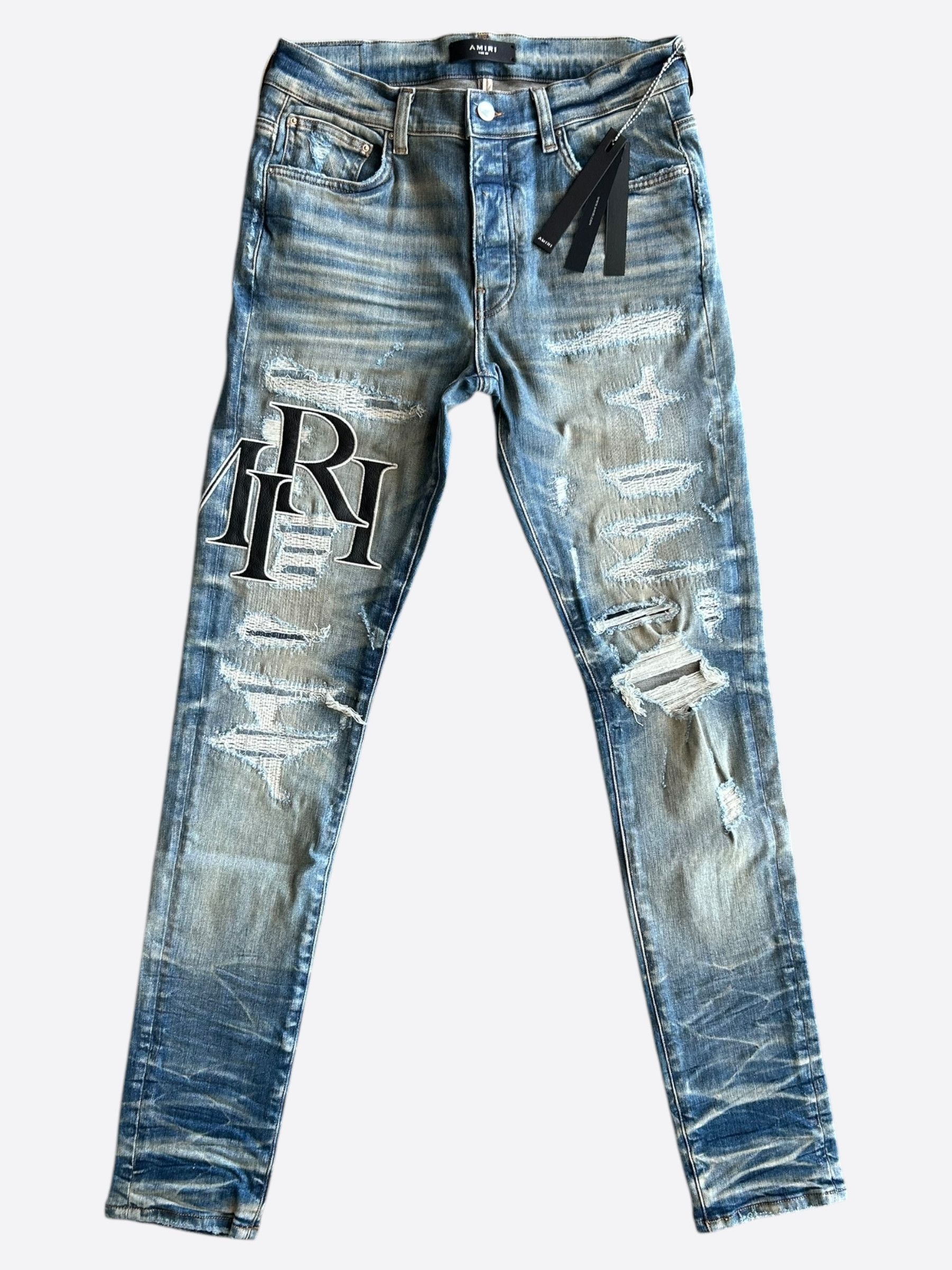 Amiri Amiri Vintage Indigo Staggered Logo Jeans | Grailed
