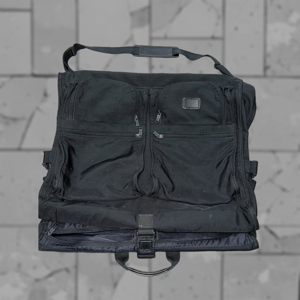 Tumi Tumi Black Nylon Bi-Fold Hanging Luggage Garment Bag Men Black Nylon Bi-Fold Hanging Luggage Garment Bag 42” unfolded 24” wide Size ONE SIZE - 1 Thumbnail