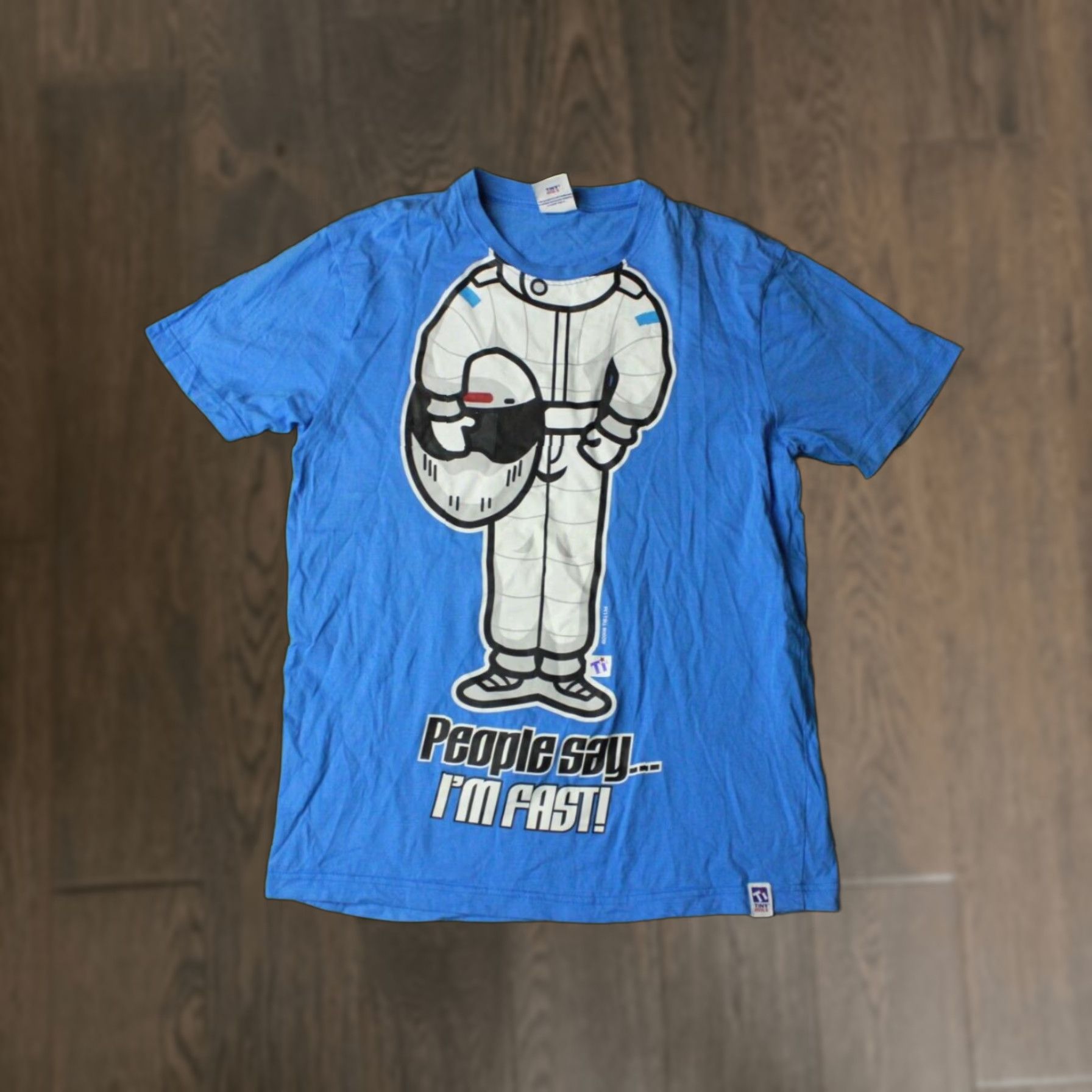 Vintage TOP GEAR STIG 2009 MEN SHIRT S BLUE SMALL ORIGINAL TINY IDOLS SHORT SLEEVE cotton tee jersey print: "People say... I'm fast!" Size US S / EU 44-46 / 1 - 1 Thumbnail