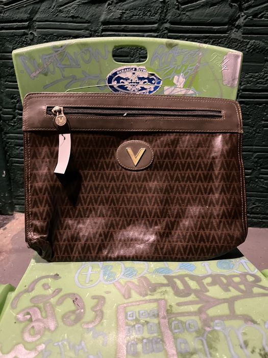 Mario valentino best sale clutch bag