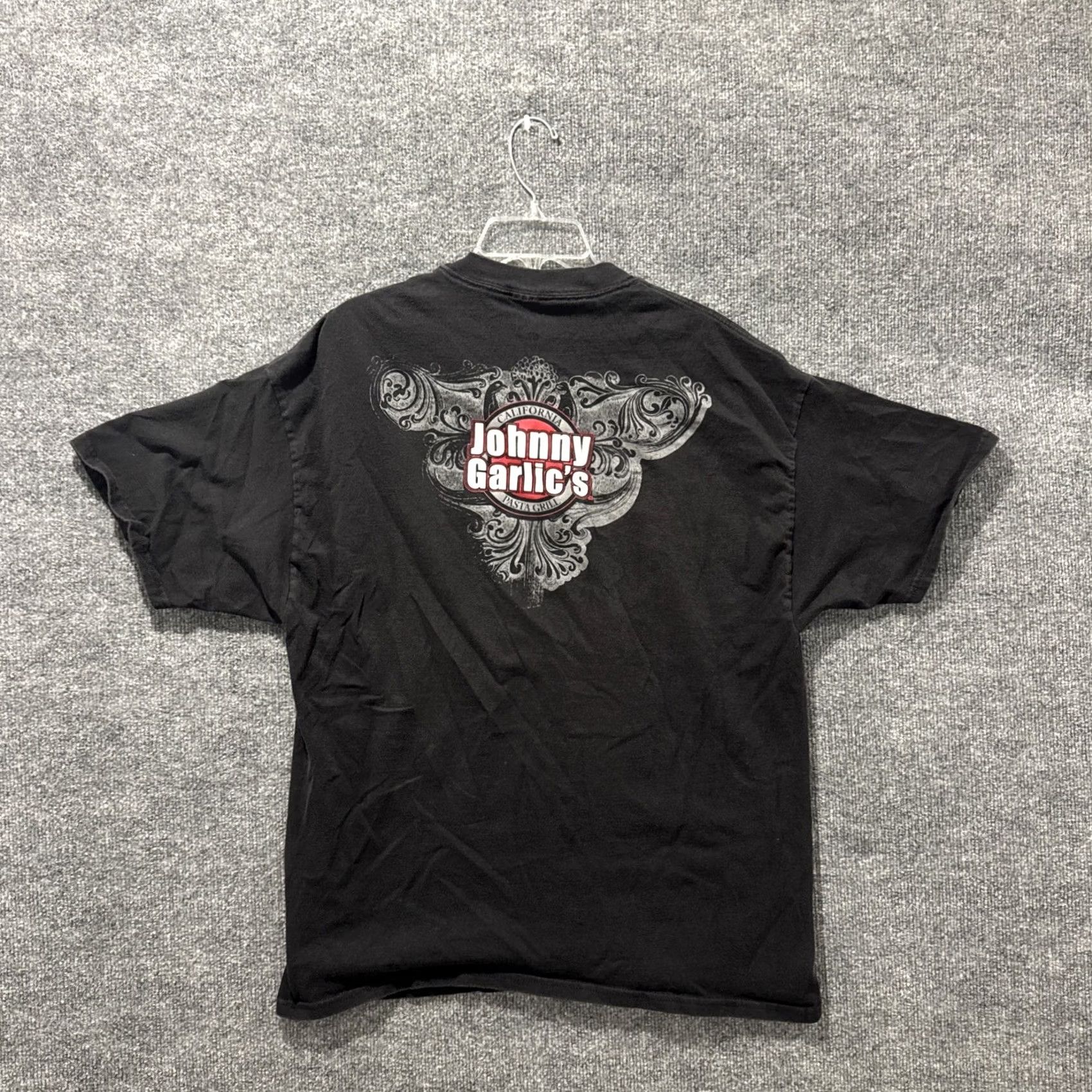 Hanes VINTAGE Johnny Garlic’s California Pasta Grill Grunge Y2K Black Short Sleeve T-Shirt XL Mens Hanes XL Black Grunge Y2K T-Shirt Size US XL / EU 56 / 4 - 6 Thumbnail