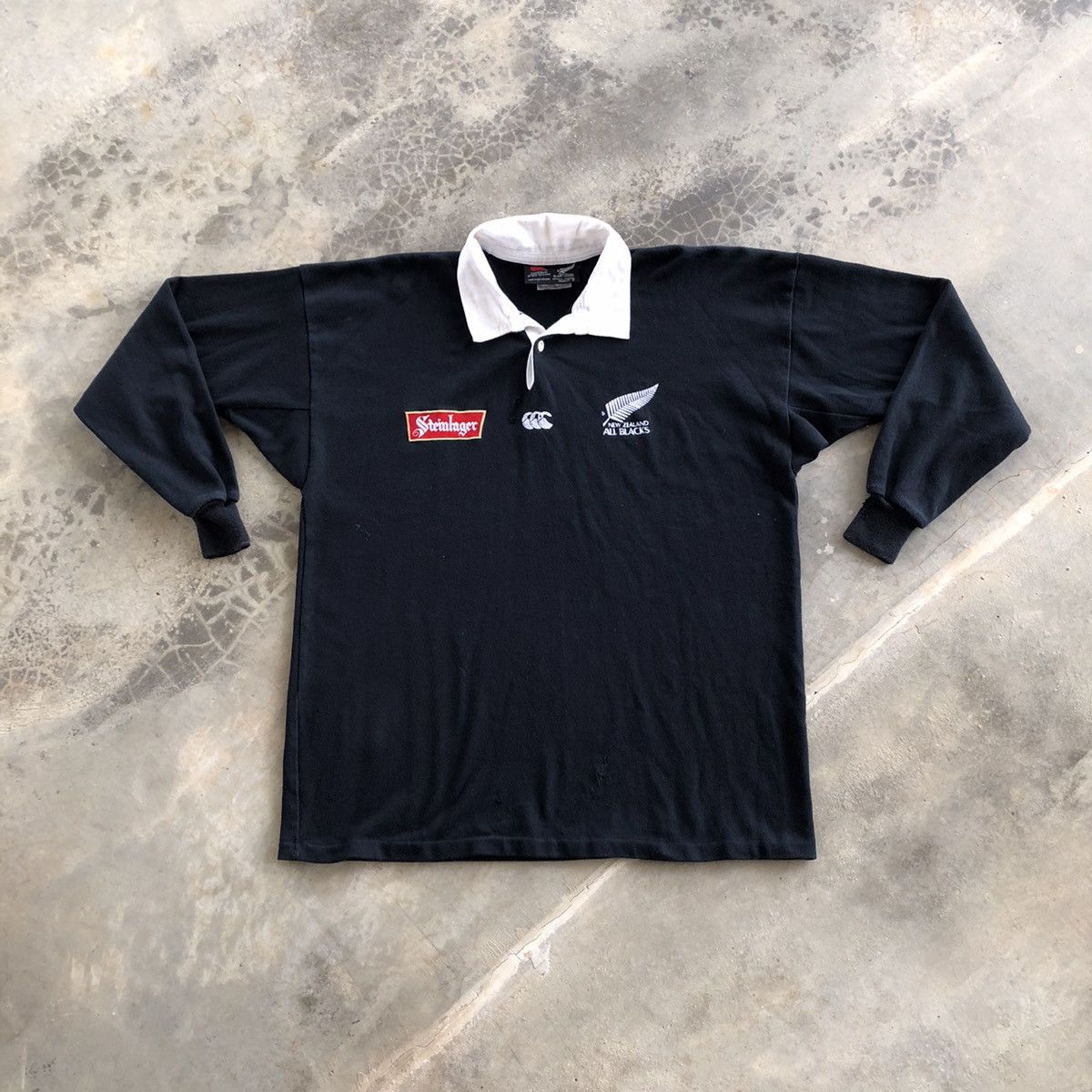 image of Canterbury Of New Zealand Steinlager Rugby Polo Shirt in Black, Men's (Size Large)
