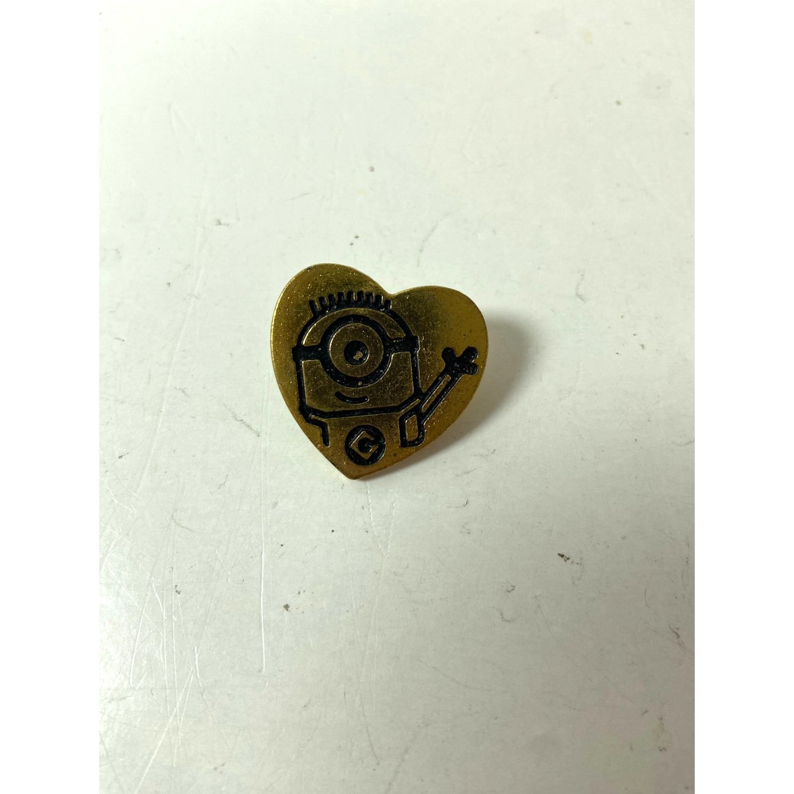 Universal Studios Universal Studios Gold Heart Minion Pin - Collectible! Size ONE SIZE - 1 Thumbnail