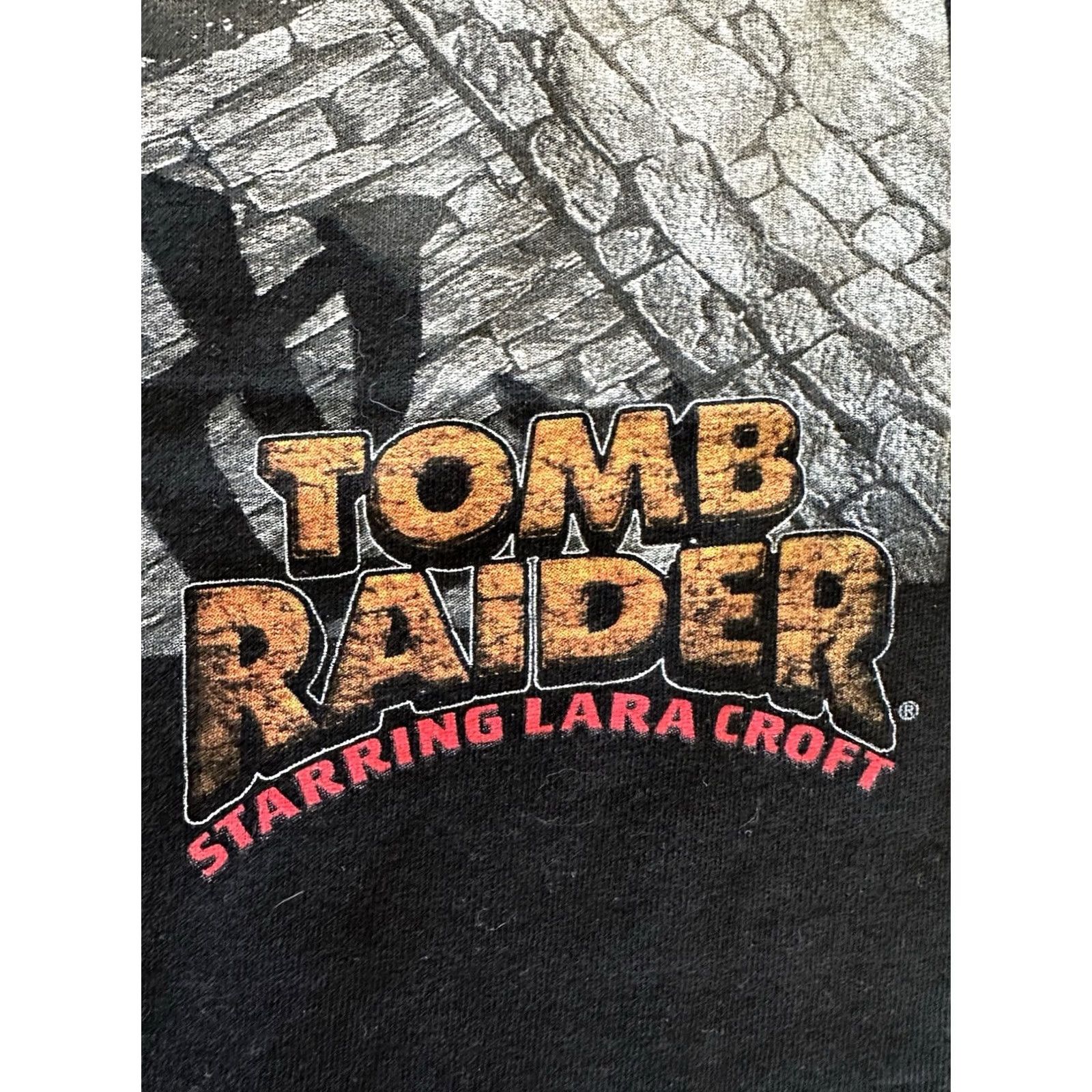 Tultex VINTAGE 90S LARA CROFT TOMB RAIDER VIDEO GAME KARATE PROMO T SHIRT XL NWOT Tultex Black Short Sleeve Cotton Graphics Mens Size US XL / EU 56 / 4 - 3 Thumbnail